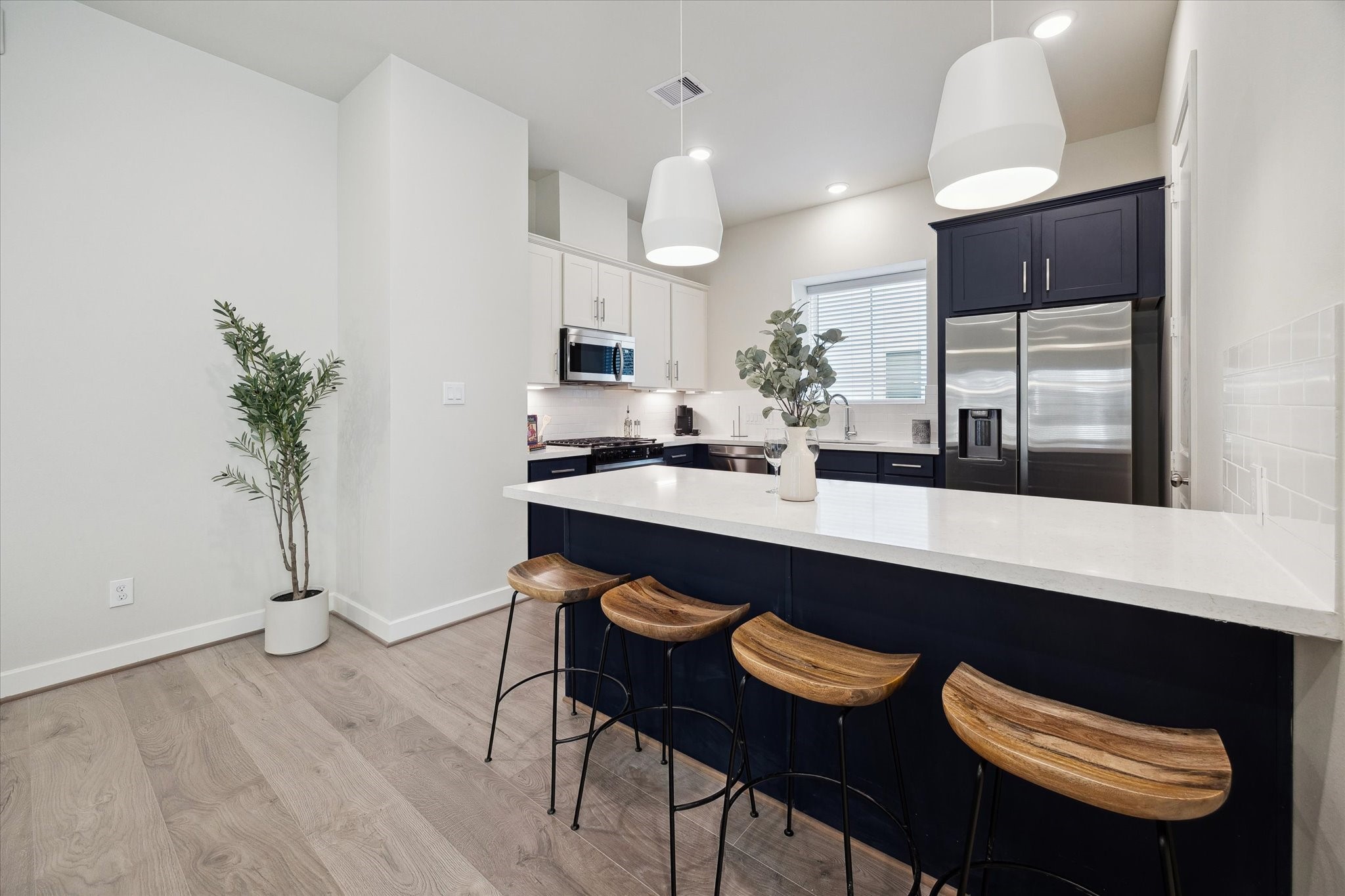 Representative photo showing the communitys model home kitchen. Layout and selections may vary.