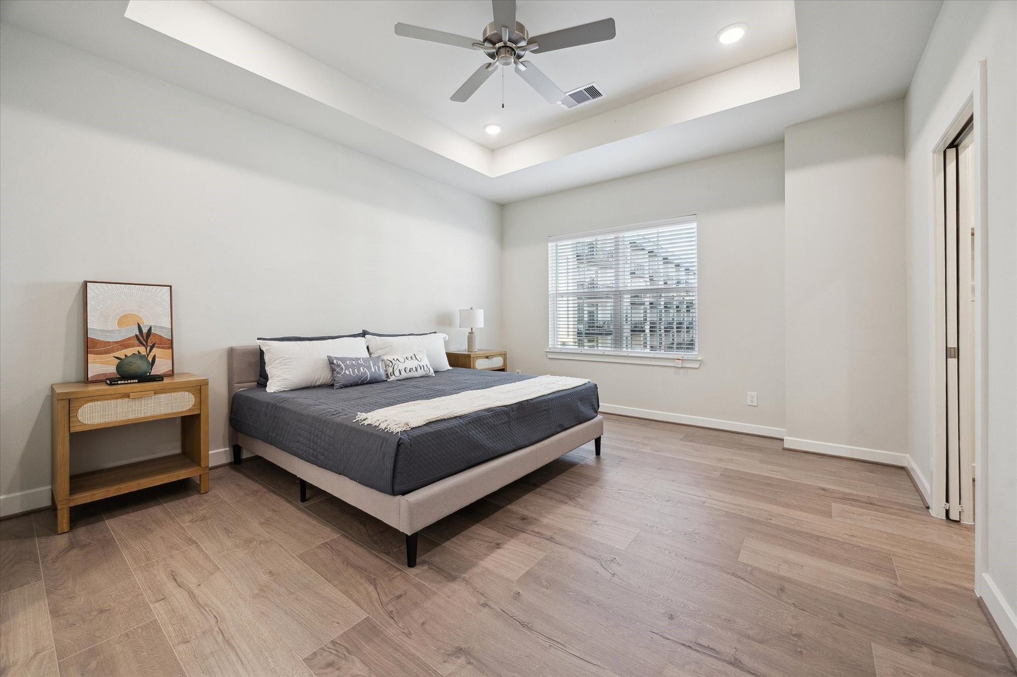 Representative photo showing the communitys model home primary bedroom. Layout and selections may vary.