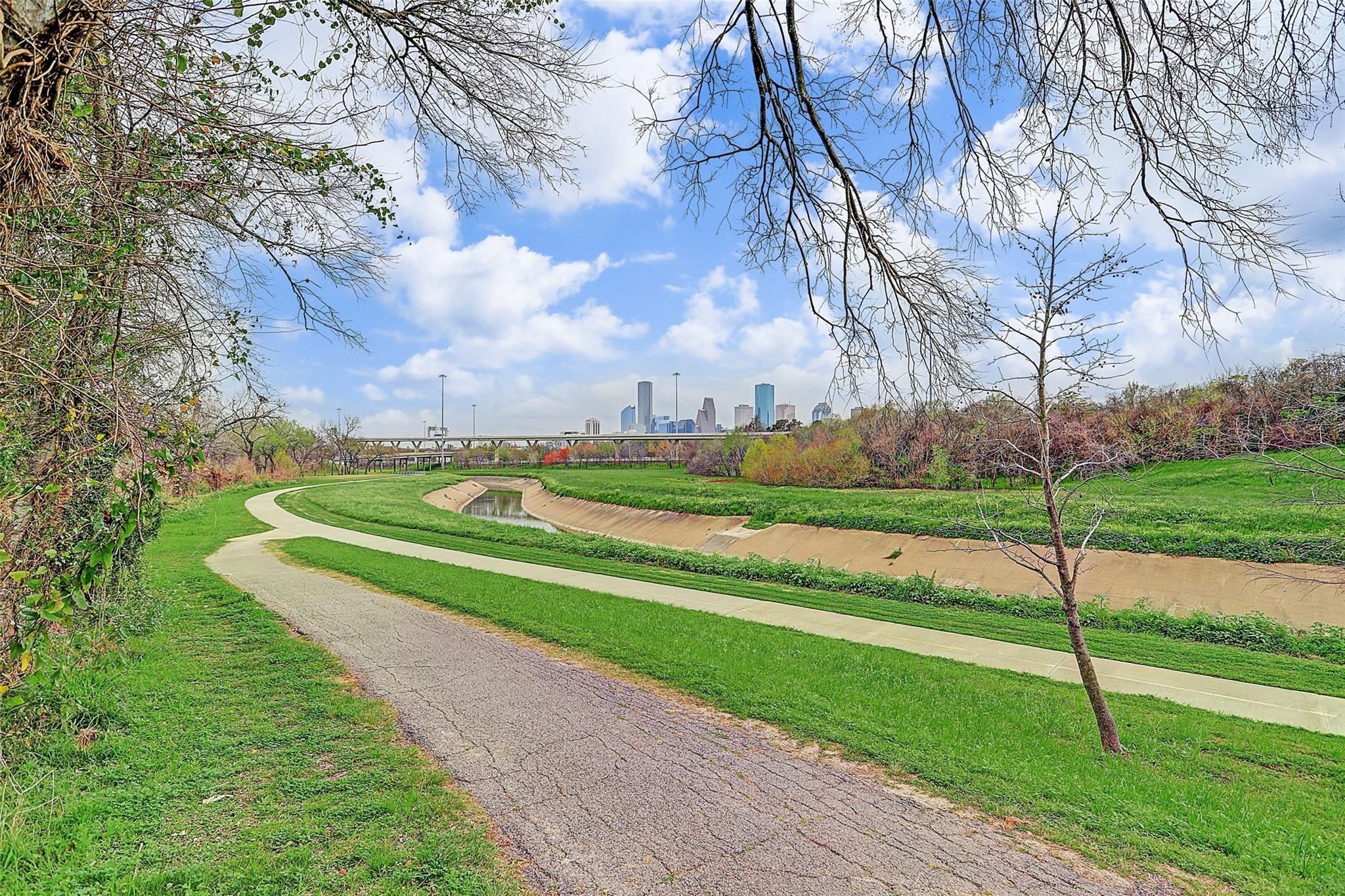 White Oak Bayou Trail nearby with skyline views and outdoor recreation.