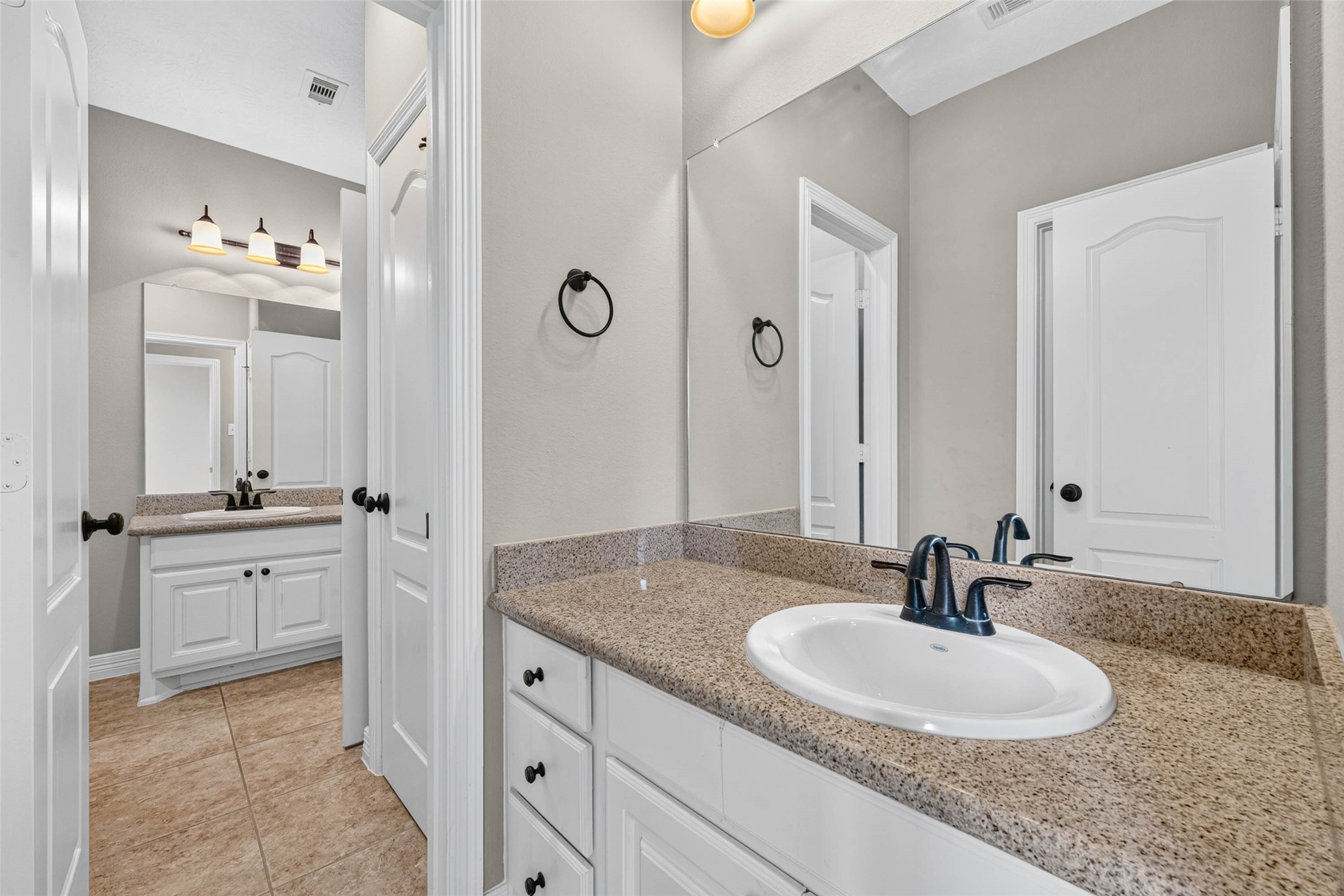 This property features a convenient Jack and Jill bathroom connecting the third and fourth bedrooms