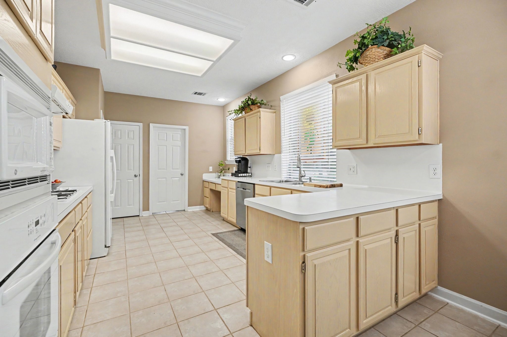 Kitchen with ample cabinet and counter space.