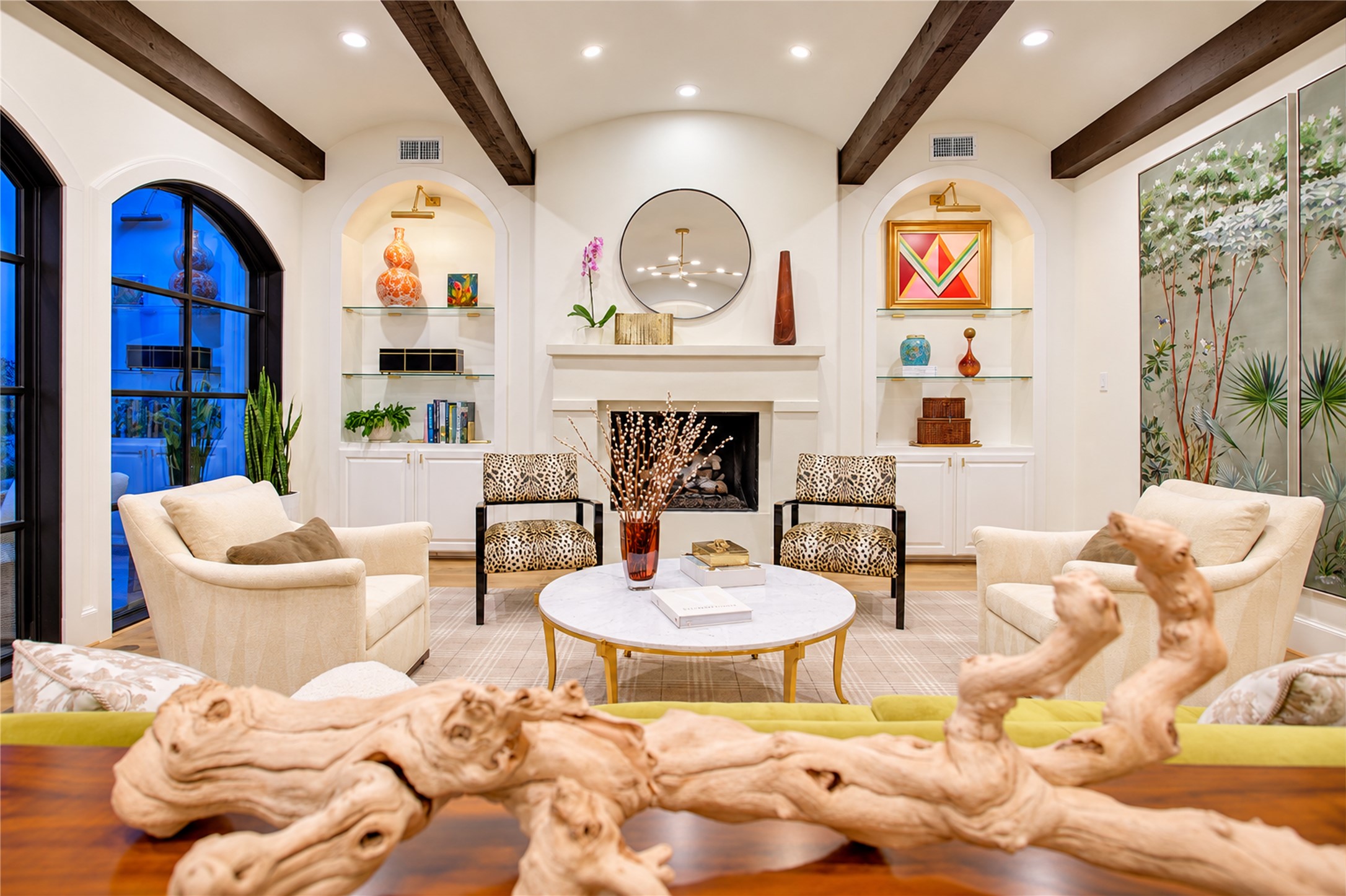Soft neutral walls and an open-concept layout create a sophisticated setting for relaxed living and effortless entertaining.