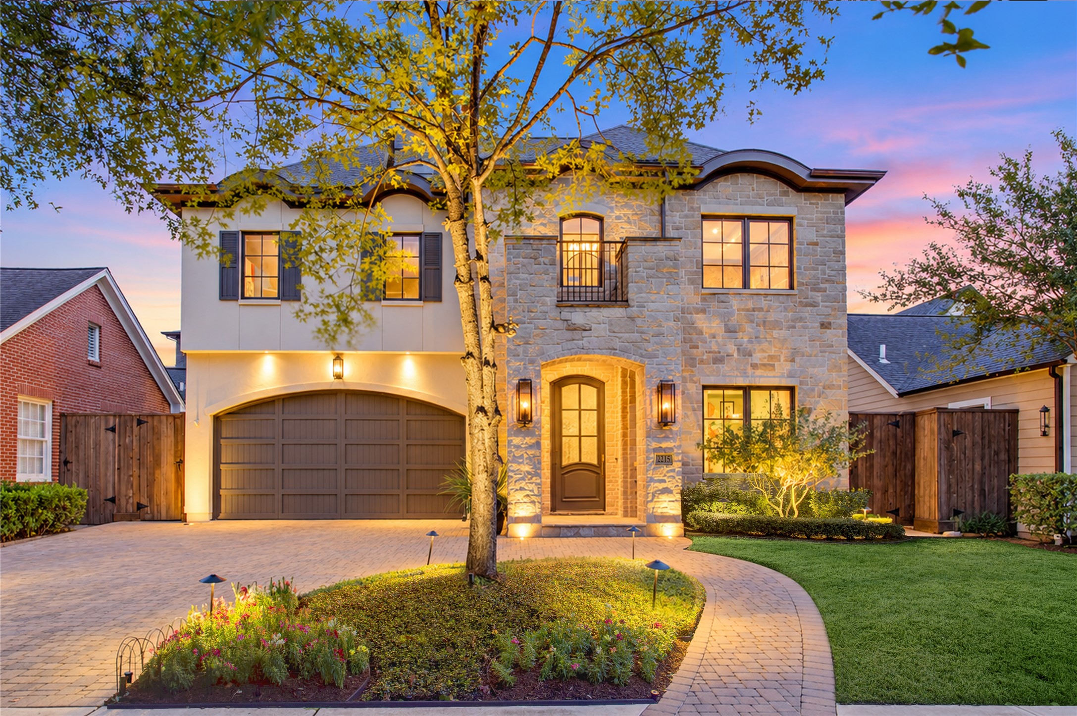 A striking first impression with a beautifully paved drive and generous additional parking.