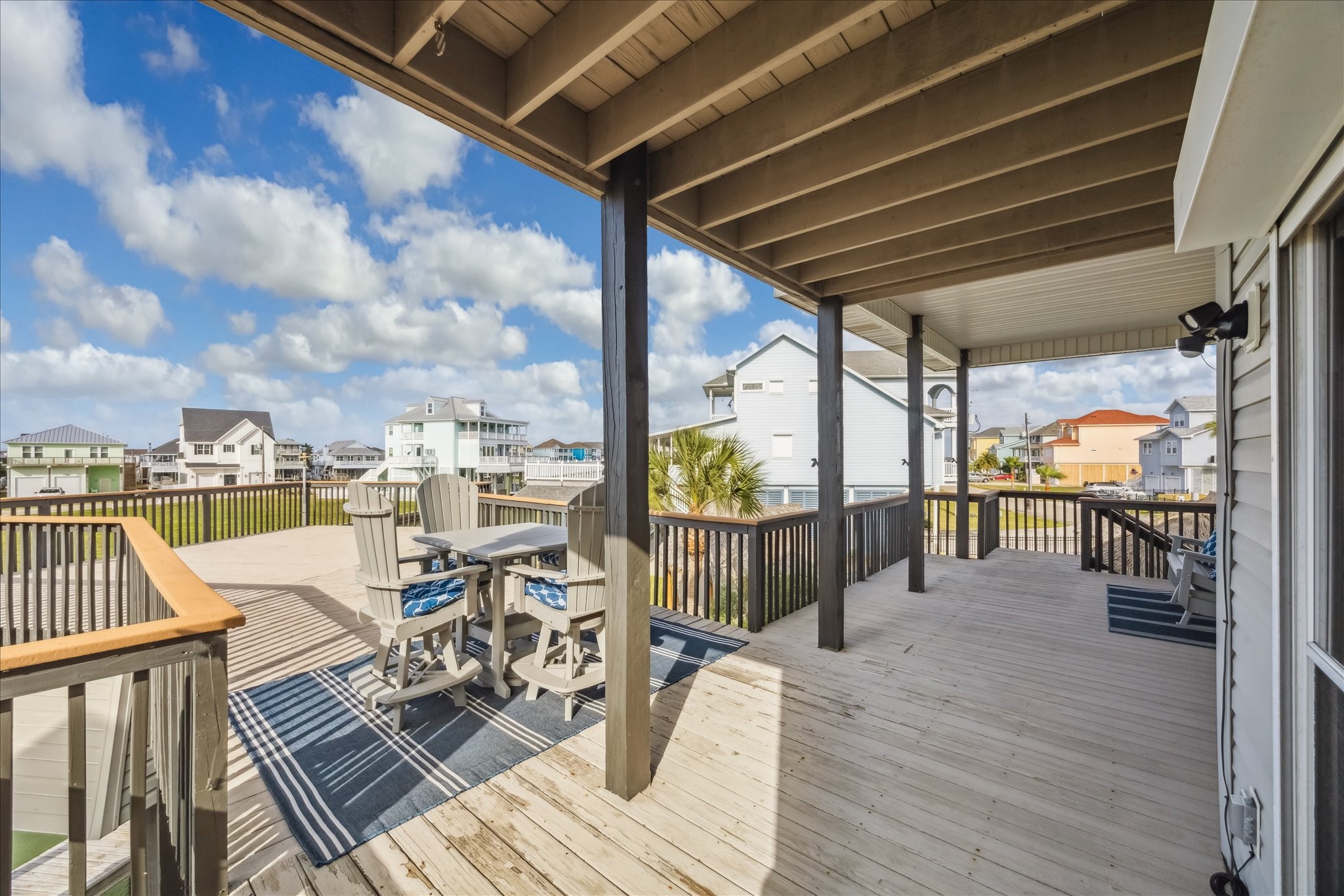 Covered deck, perfect for outdoor dining and relaxation.