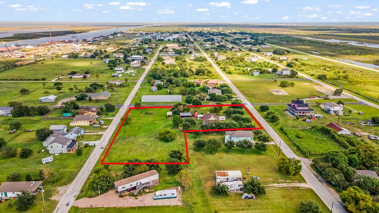 The Home Lot with adjacent 3 lots totaling 1.6 acres
