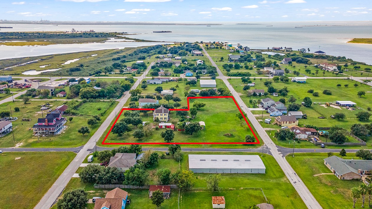 The Home Lot with adjacent 3 lots totaling 1.6 acres