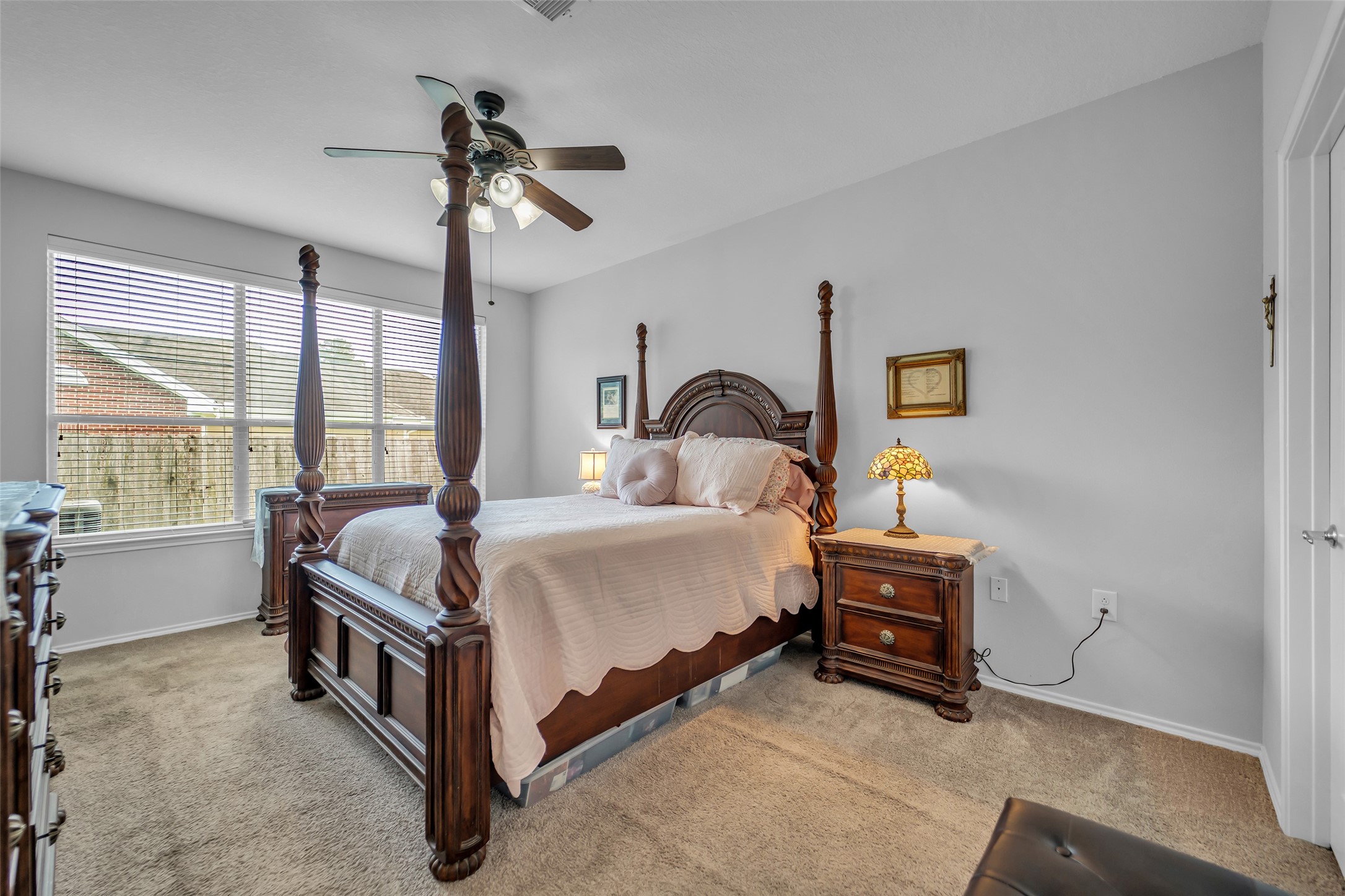 Carpeted primary bedroom