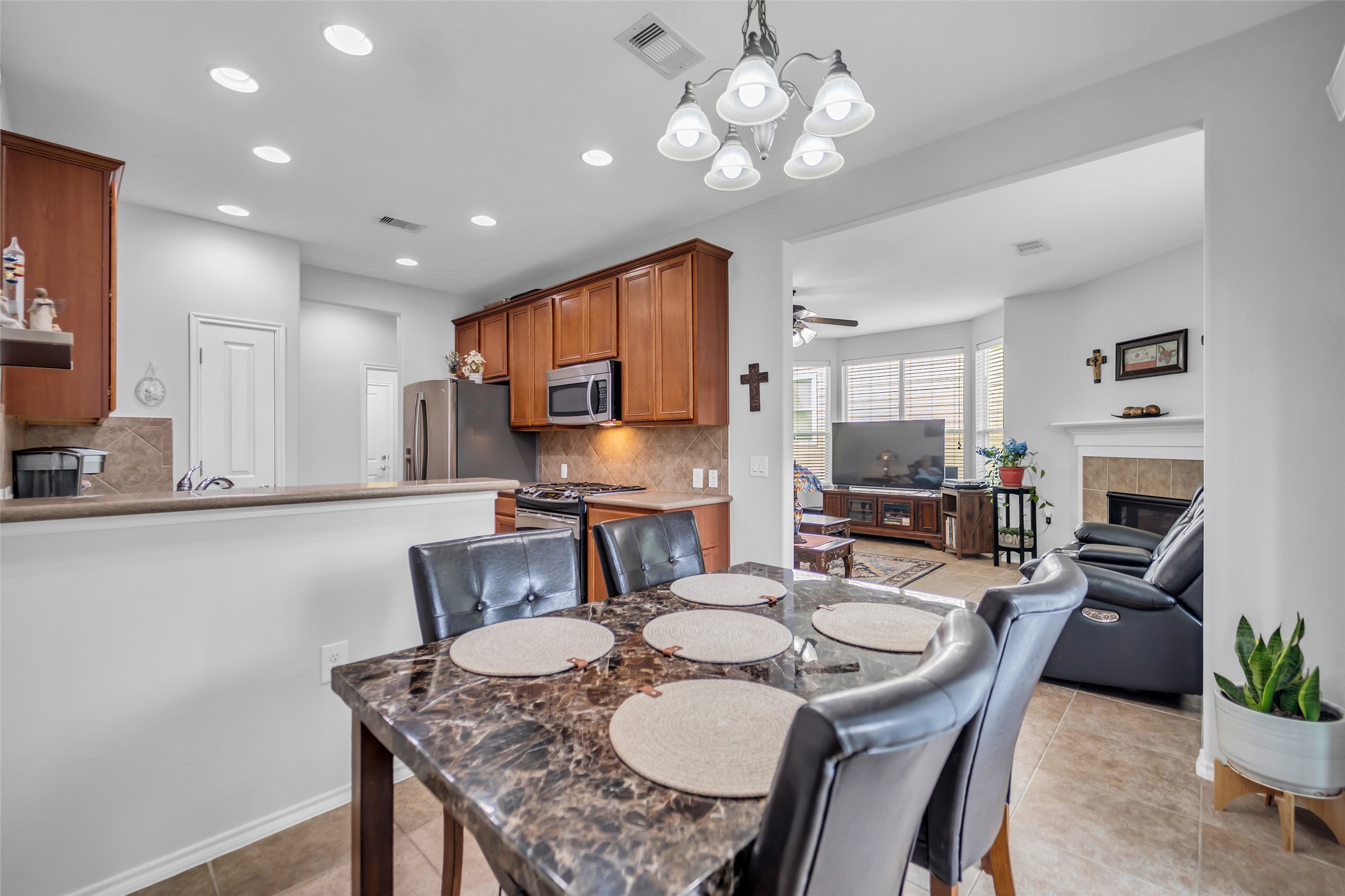 From this view you can see the kitchen, dining area and living room