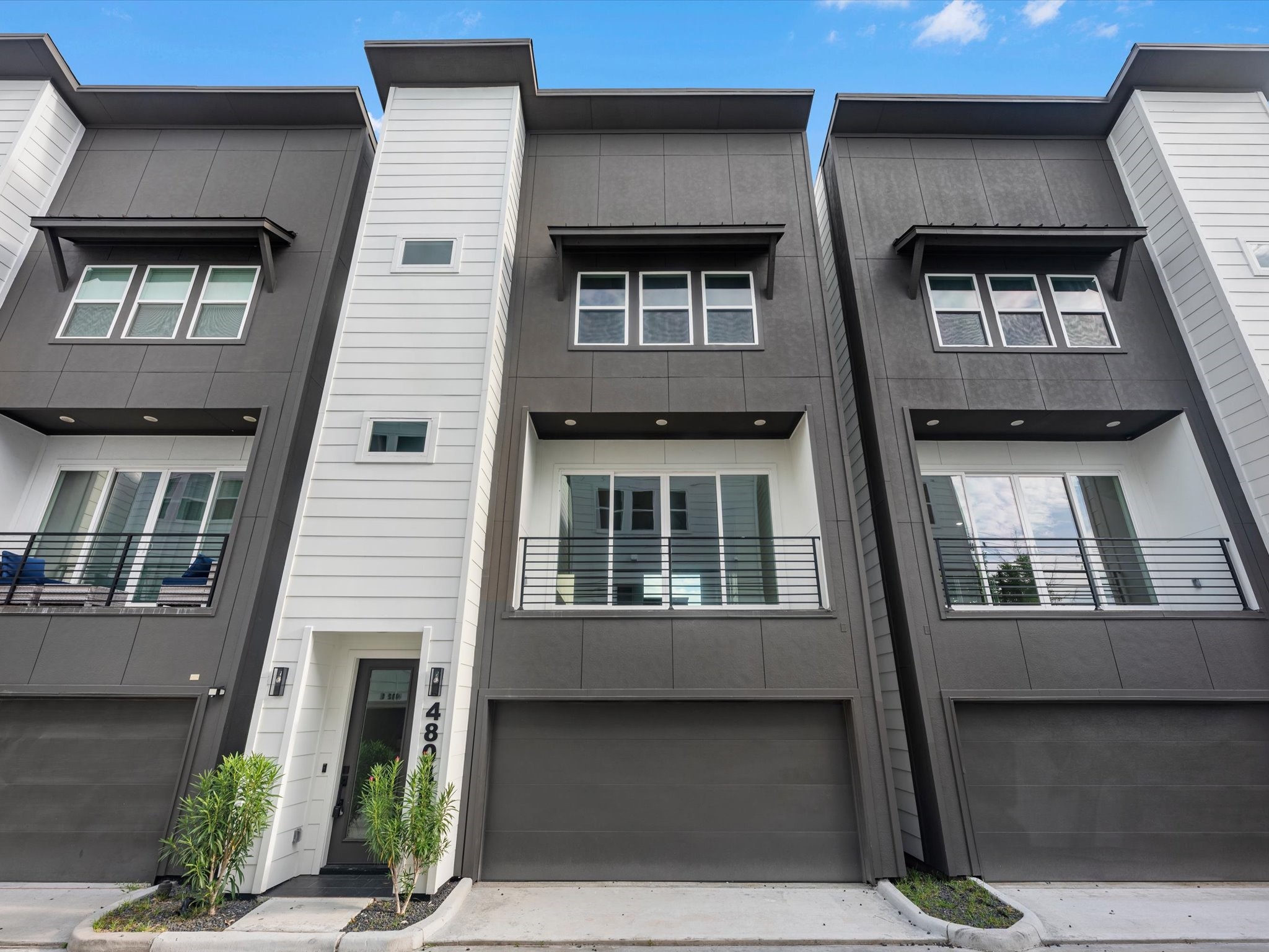 Beautiful exterior of this 3-bedroom, 3.5-bath home featuring a private balcony and a gated community setting. Located inside the Loop with easy access to major highways, dining, shopping, and everything Houston has to offer. Beautiful exterior of this 3-bedroom, 3.5-bath home featuring a private balcony and a gated community setting. Located inside the Loop with easy access to major highways, dining, shopping, and everything Houston has to offer.