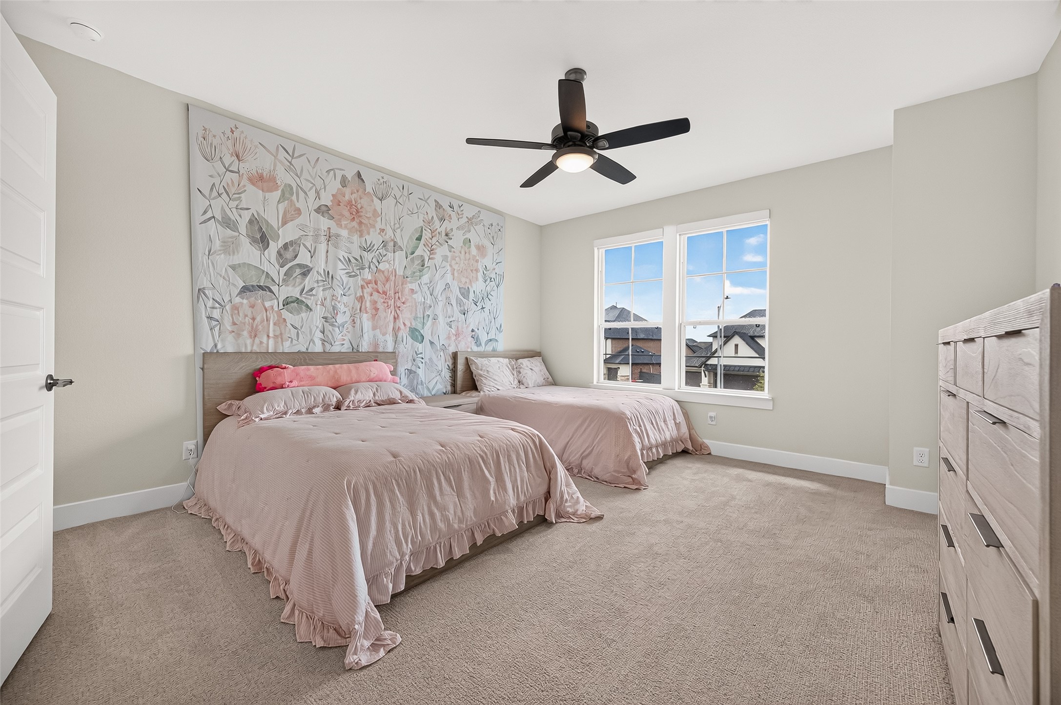 Three additional generously sized bedrooms are located upstairs, all offering spacious walk-in closets. Bedroom shown share a Jack-and-Jill bath!