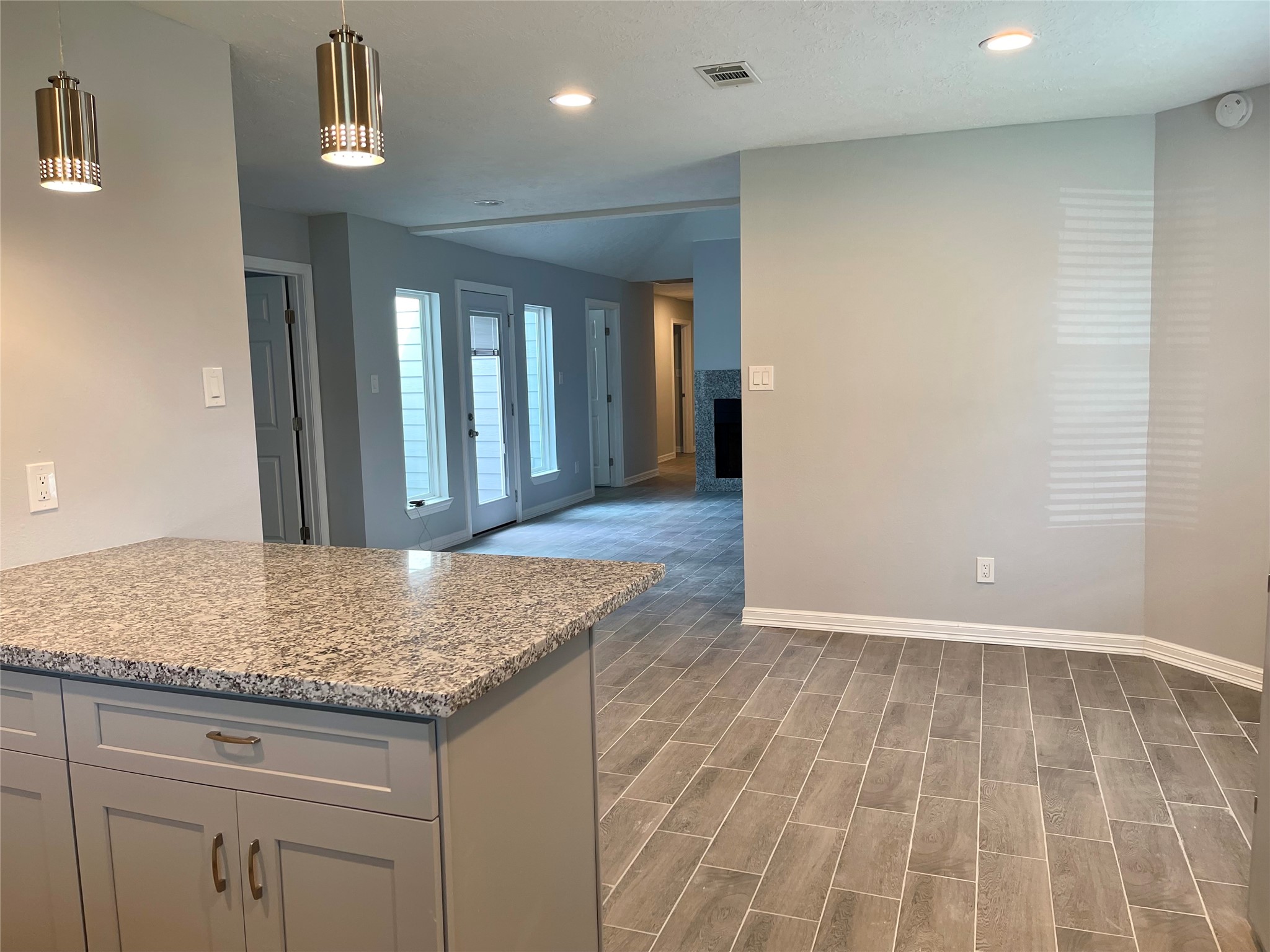 View from kitchen opens to family room