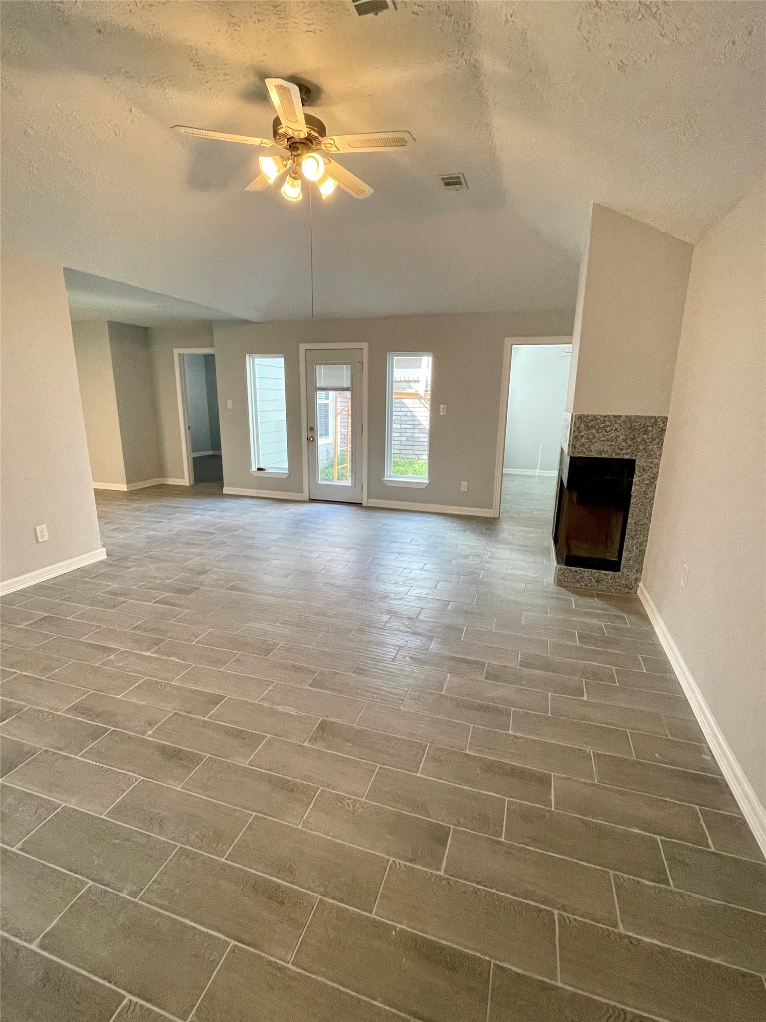 Another view of Family room with lot of natural light Another view of Family room with lot of natural light