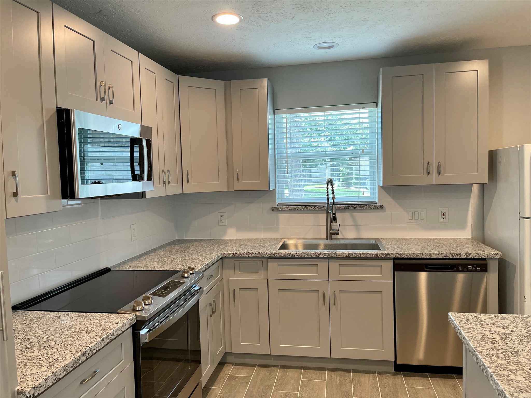 New Upgraded Kitchen with new cabinets granite countertops and stainless steel appliances New Upgraded Kitchen with new cabinets granite countertops and stainless steel appliances