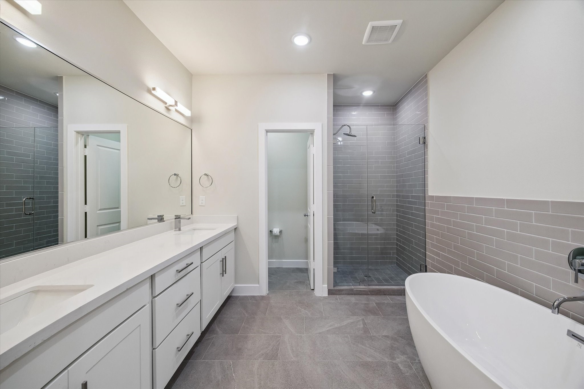 Representative photo showing the communitys model home primary bathroom. Layout and selections may vary.