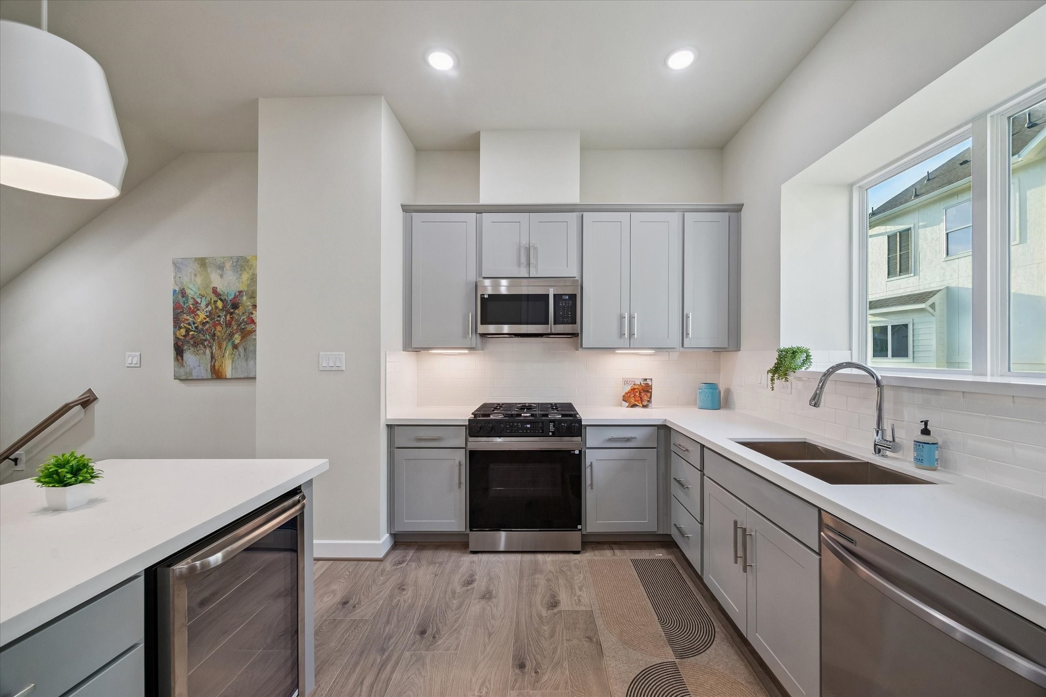 Representative photo showing the communitys model home kitchen. Layout and selections may vary.