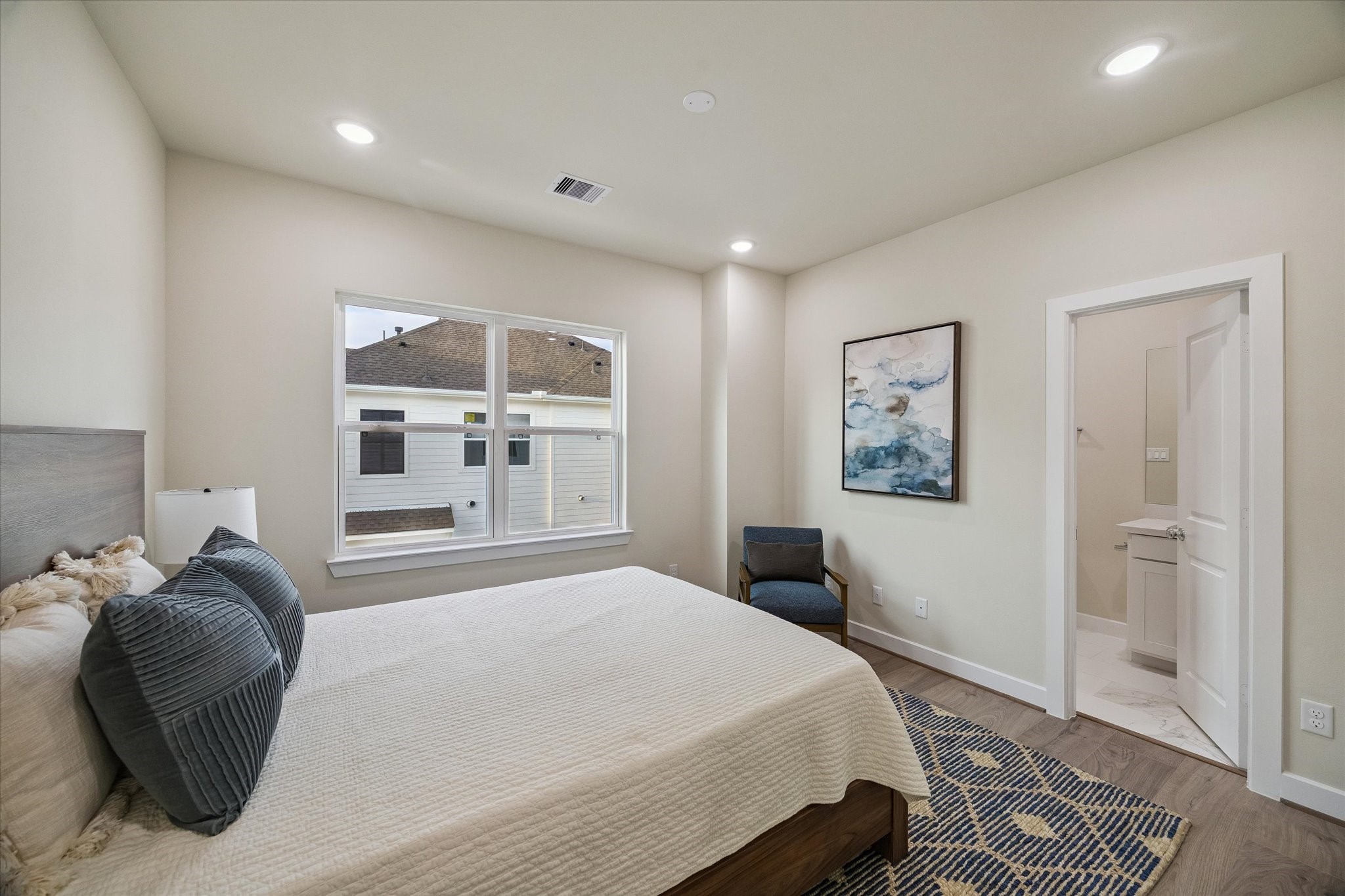 Representative photo showing the communitys model home secondary bedroom. Layout and selections may vary.