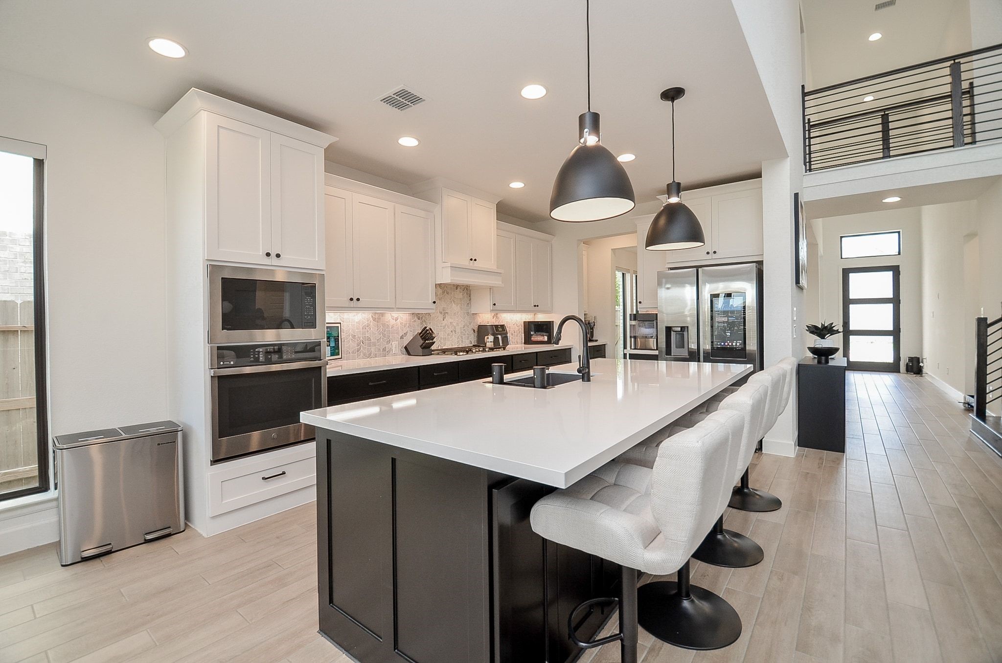 A chef's dream! Spacious island, built-in appliances, and abundant counter space.
