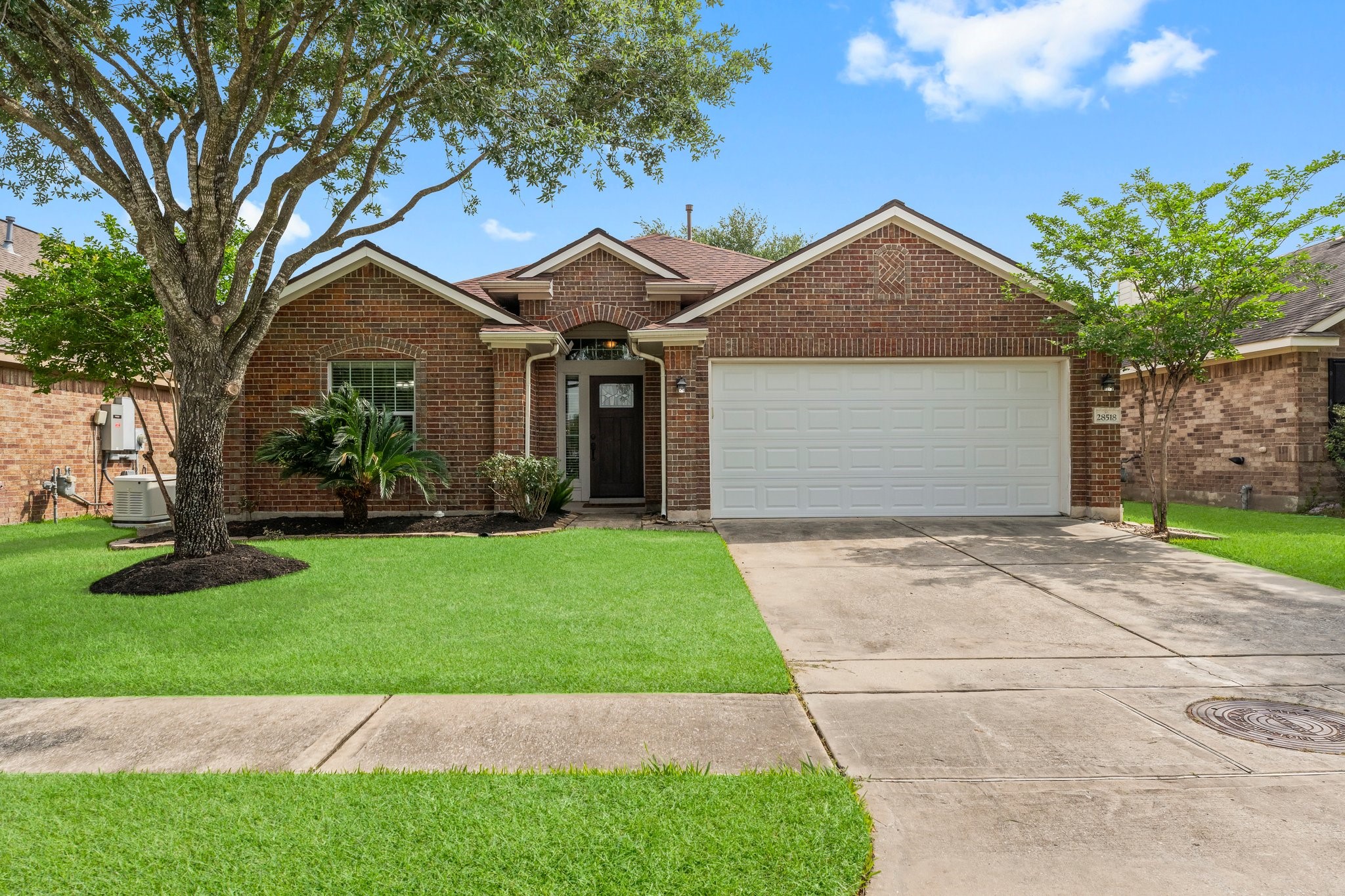 Charming one story home with mature landscaping and great curb appeal.