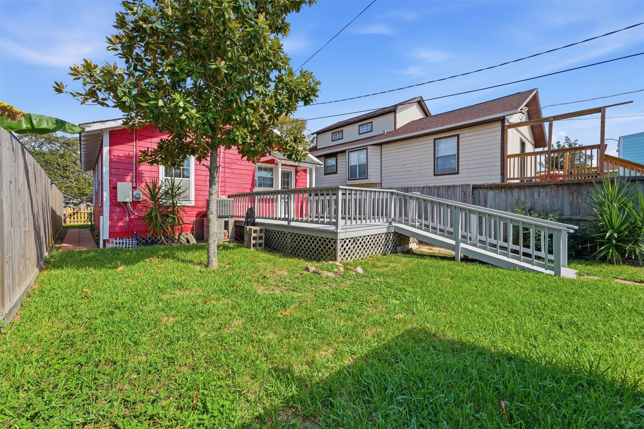 Nice deck and fenced backyard.