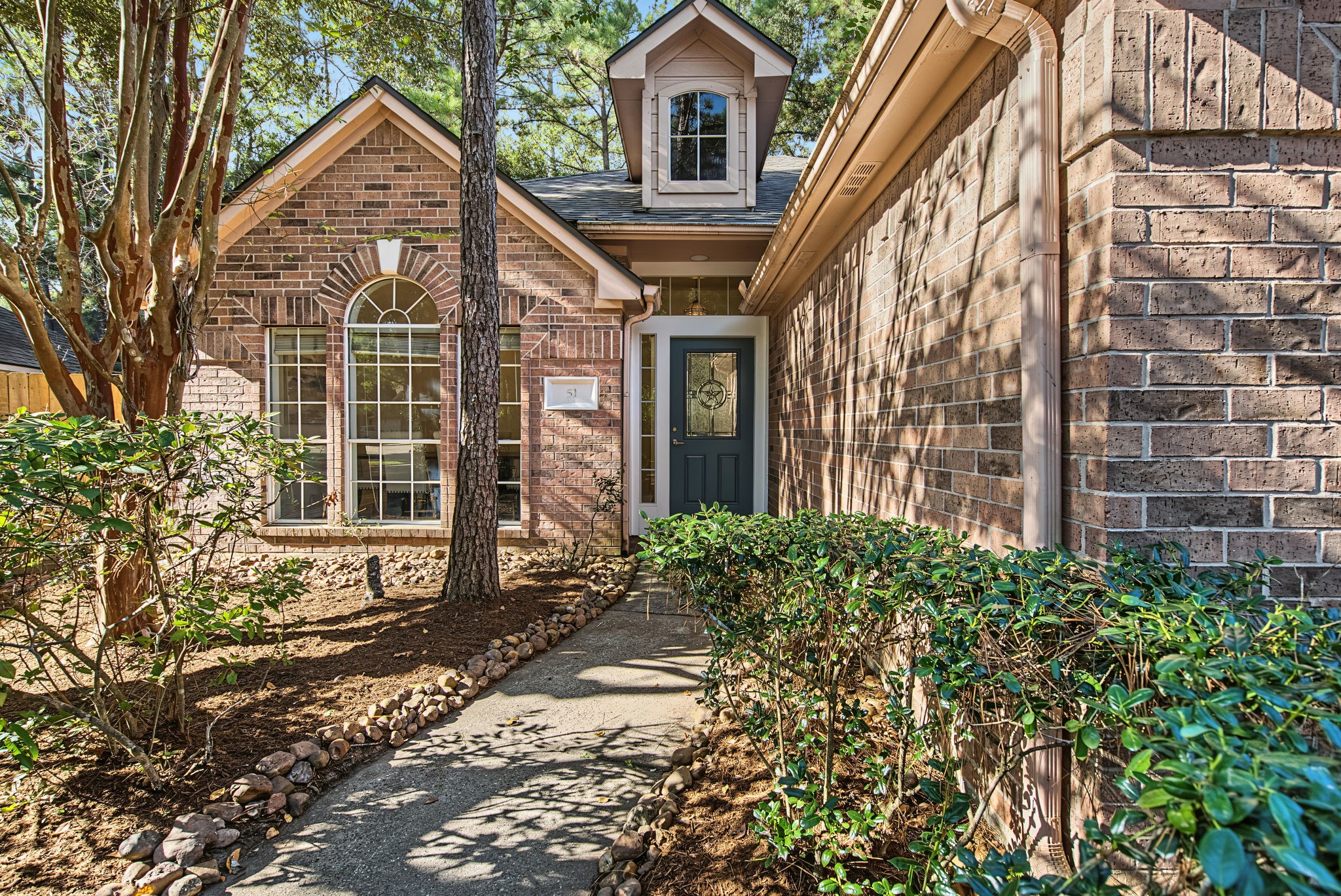 An established tree canopy frames this single-story Alden Bridge home. Major improvements include a roof replaced in December 2025 and AC replaced in May 2025.
