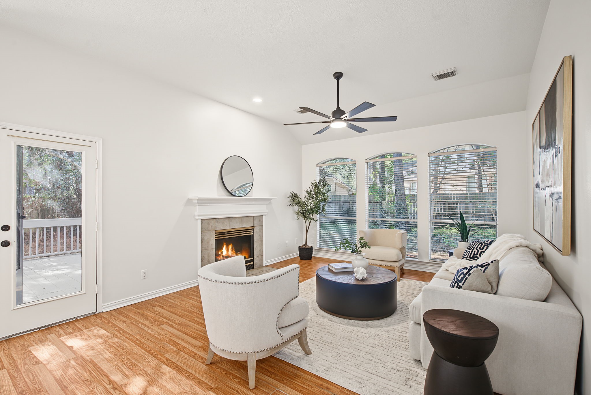 Backyard views and direct access to the deck connect indoor living with outdoor relaxation.