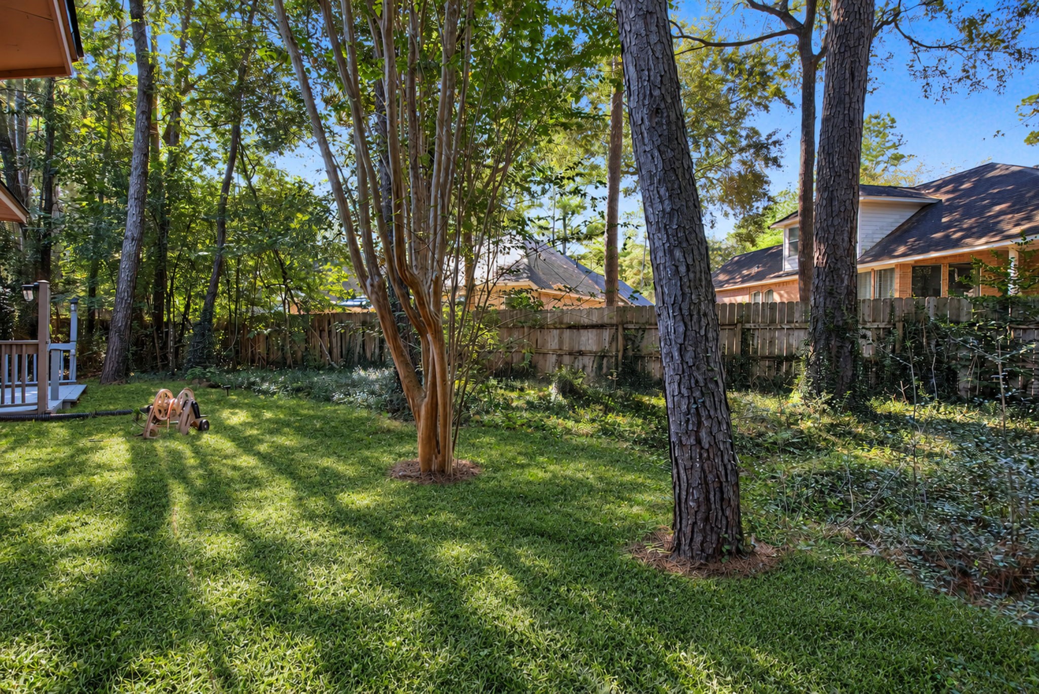 Reimagined backyard with new sod installed.