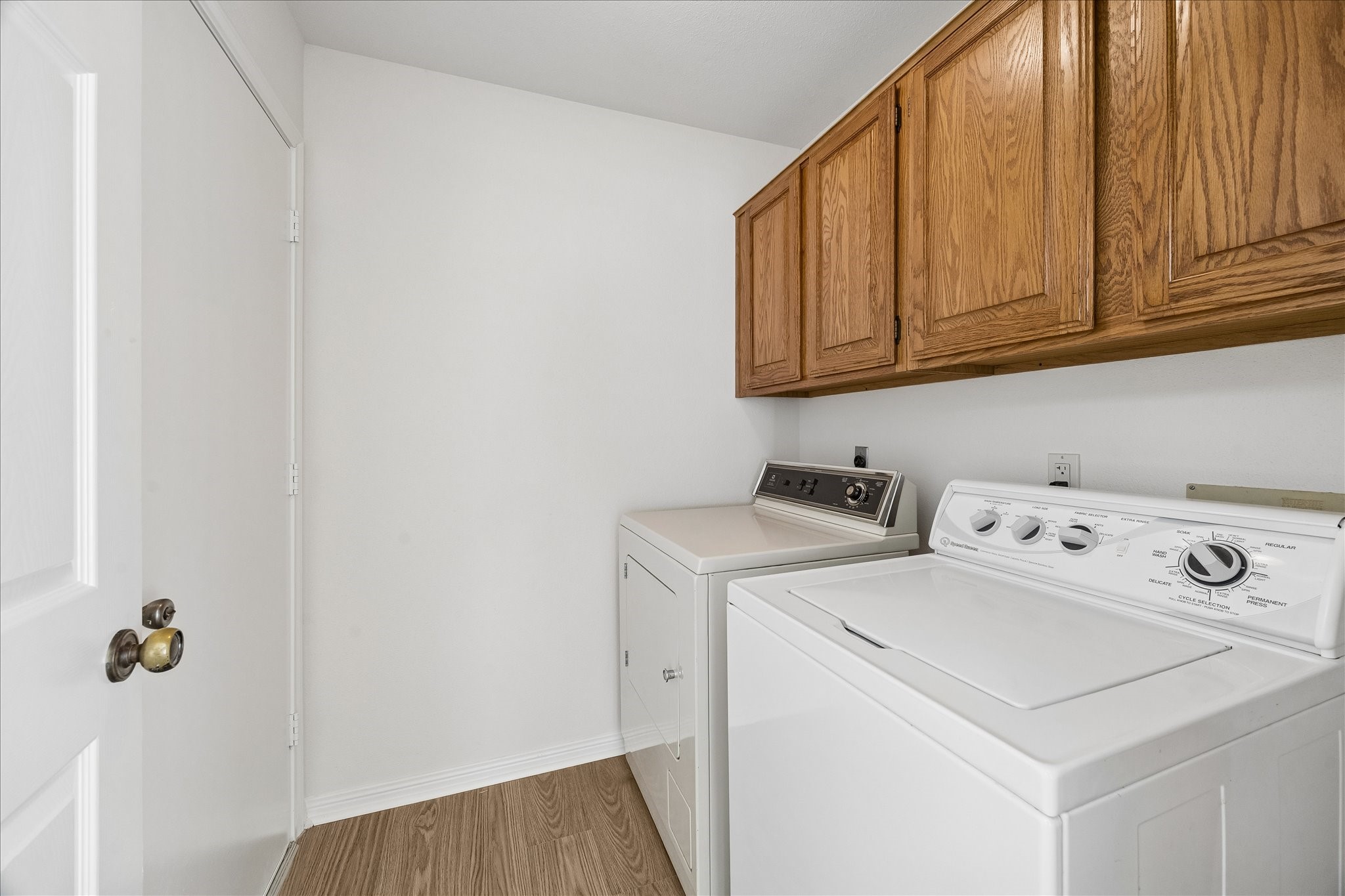 Laundry room with Speed Queen washer