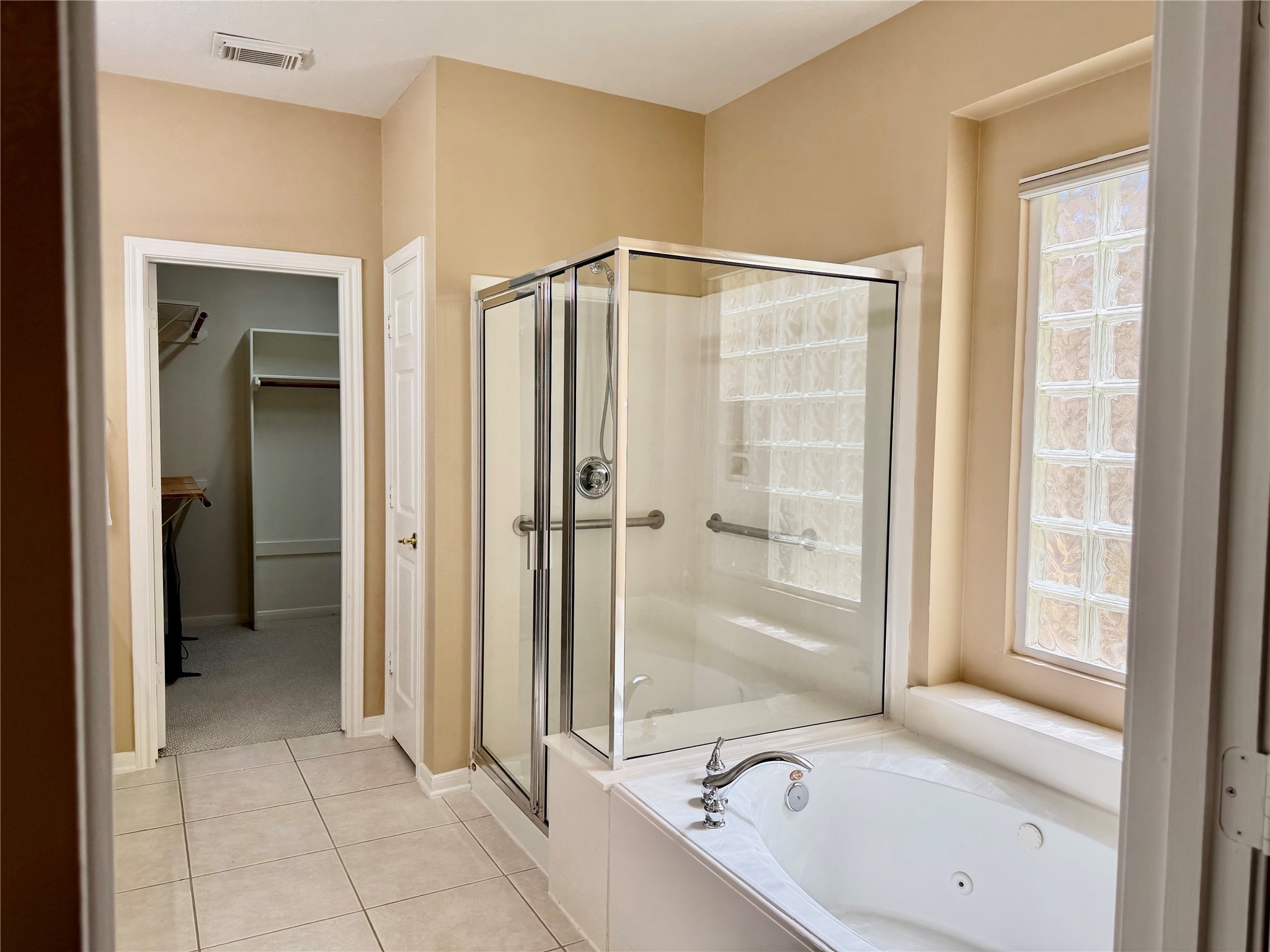 Large soaking tub and stand up shower