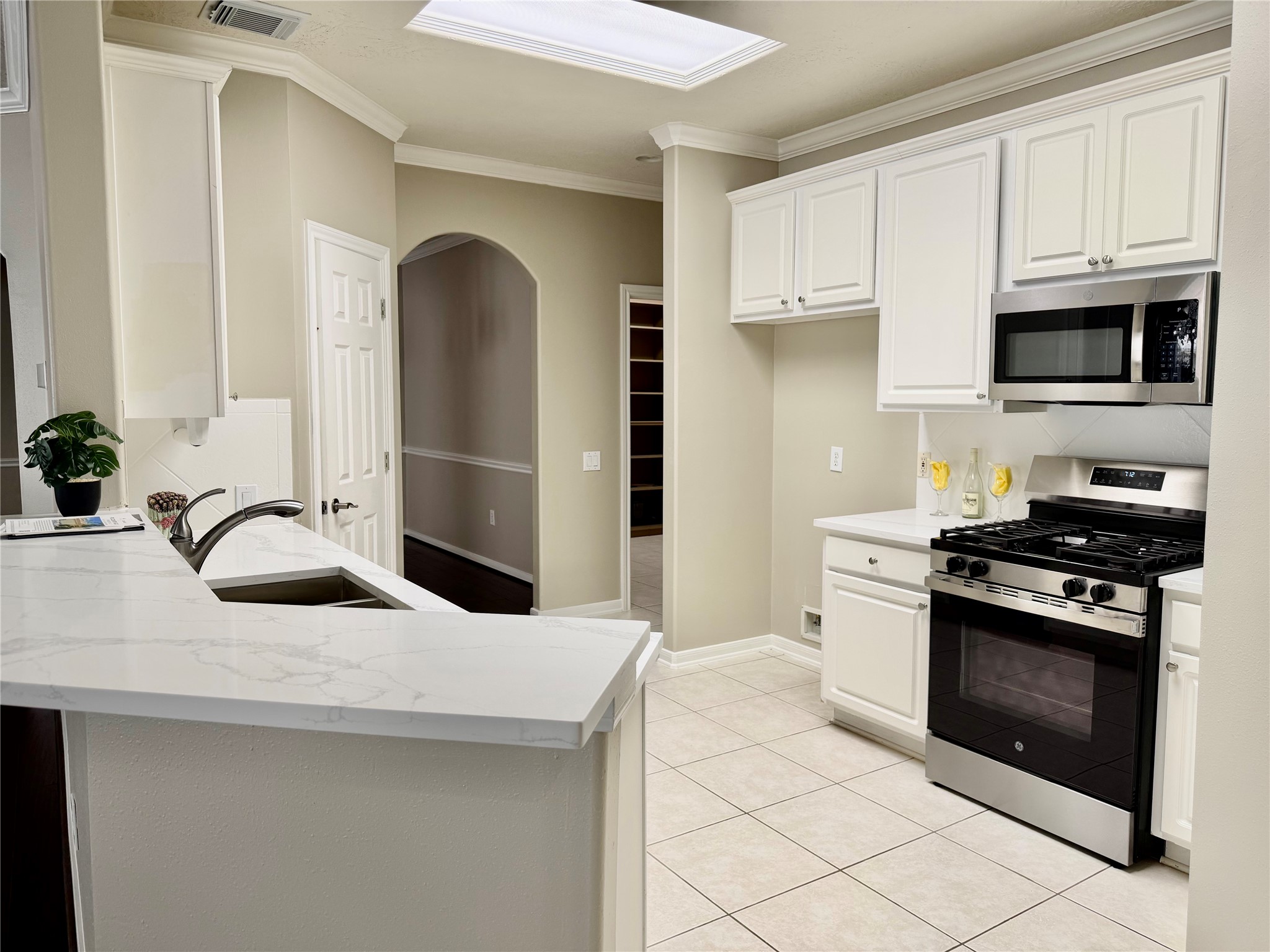 All new quartz counters in kitchen and both baths All new quartz counters in kitchen and both baths