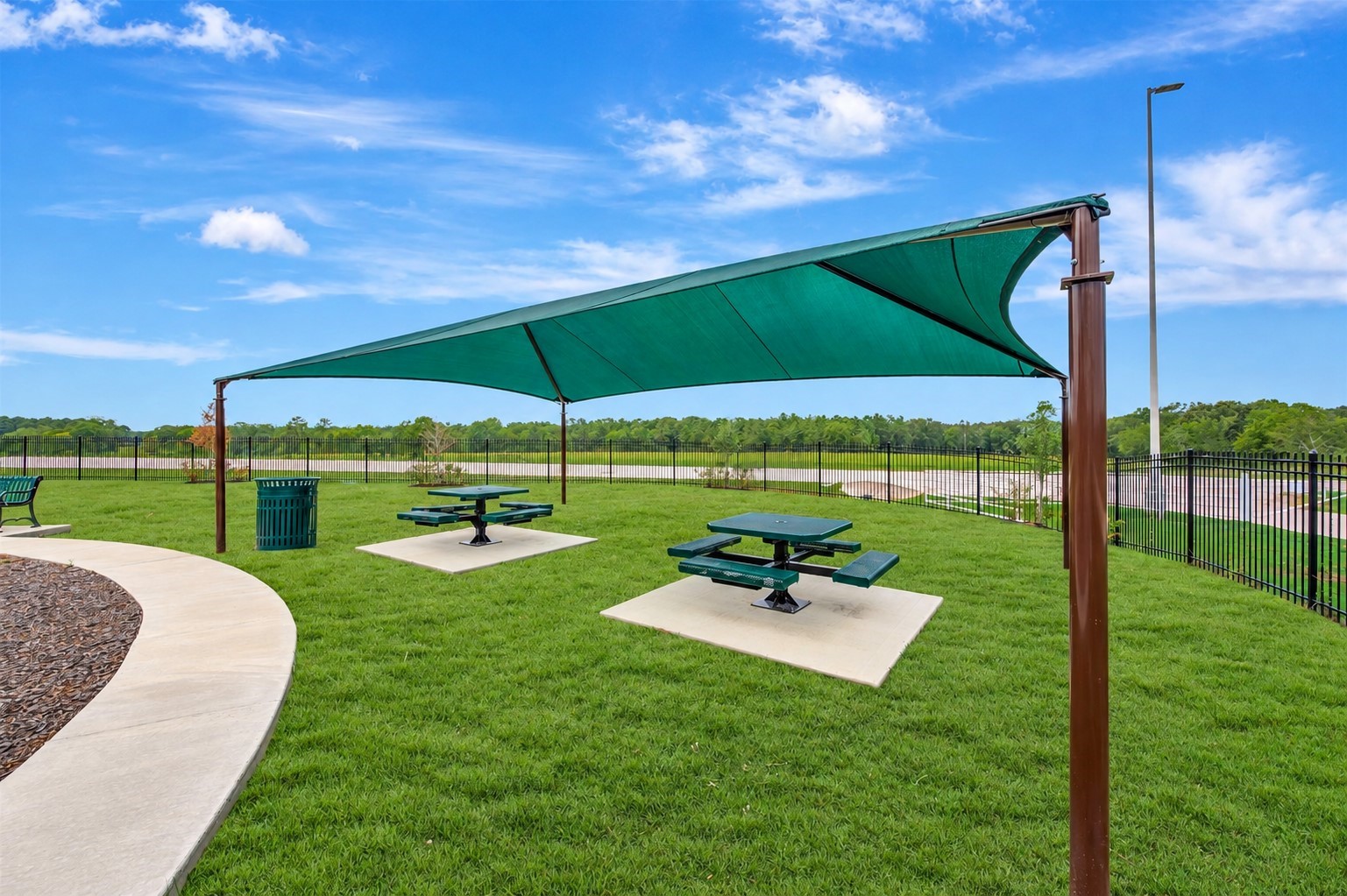Charming community picnic tables, ideal for gatherings and relaxation.