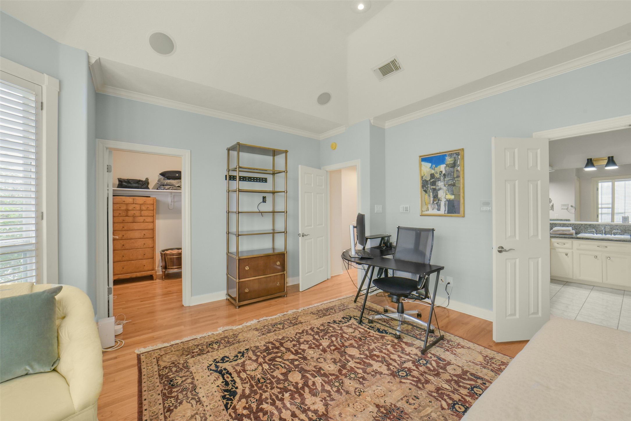 primary bedroom has a large walk in closet