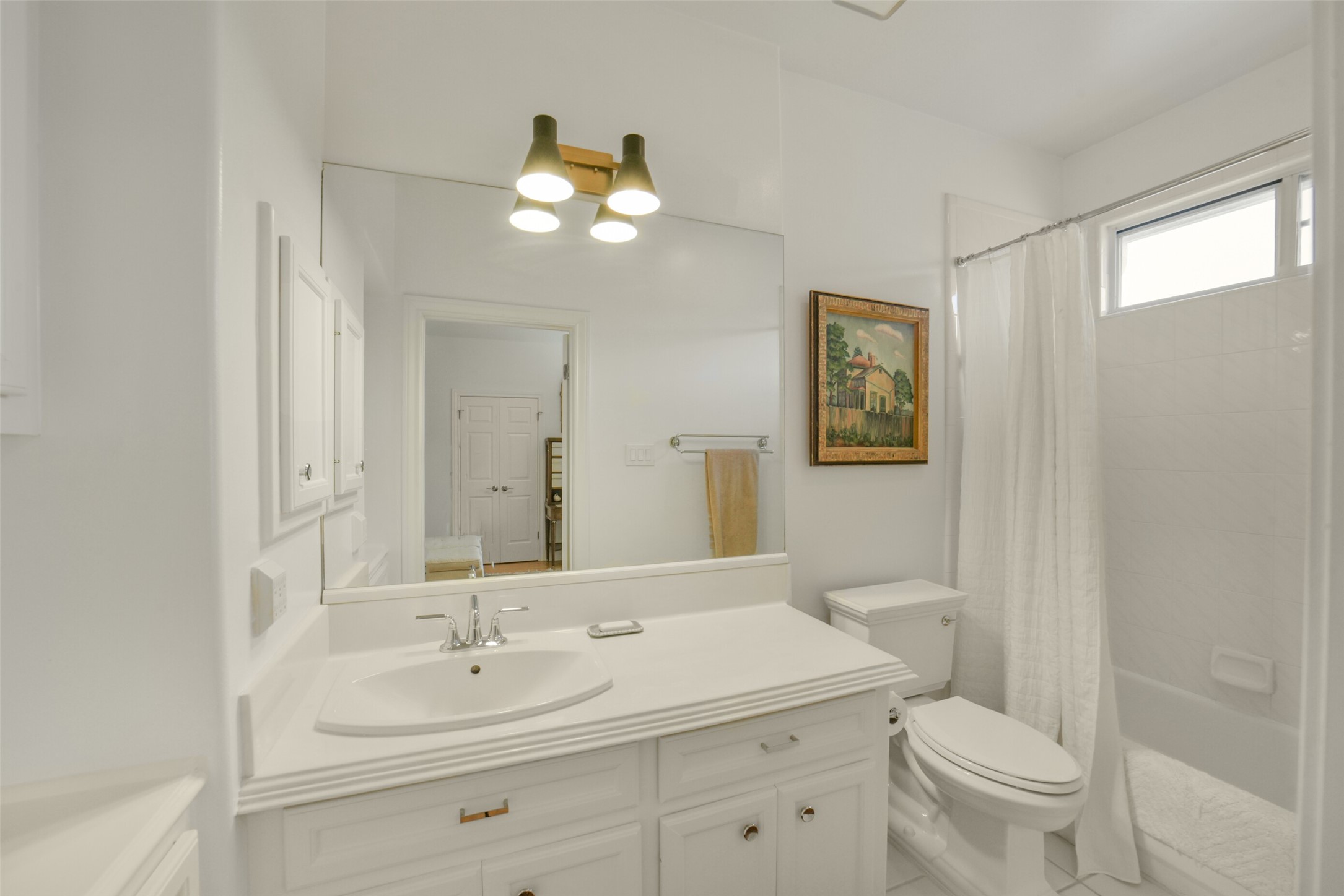 full bathroom connected to third floor secondary bedroom