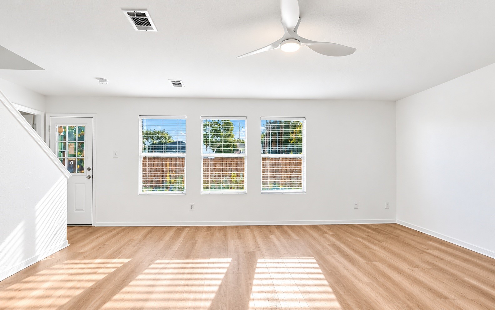 Spacious living room with lots of natural light!