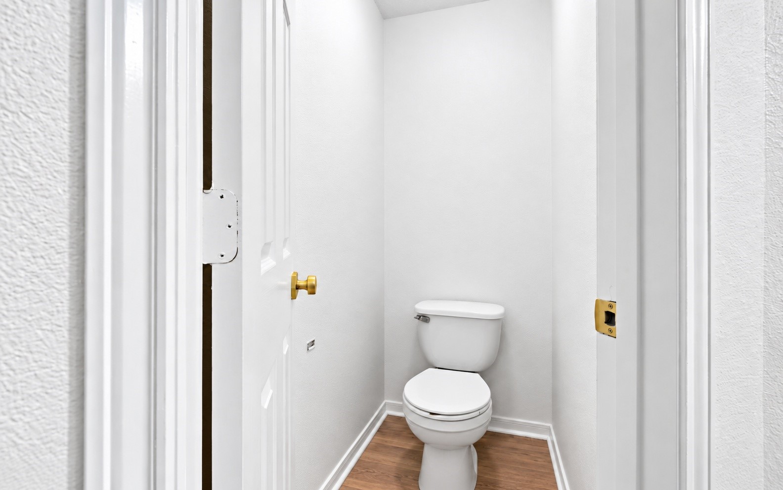 The toilet in its own separate room in the bathroom!