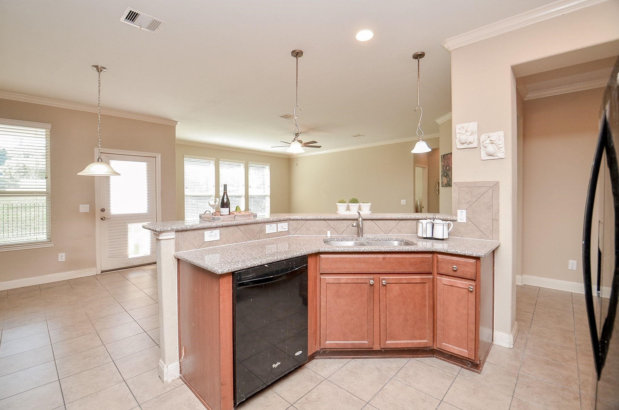 Big Breakfast Bar open to Dining and Living Room