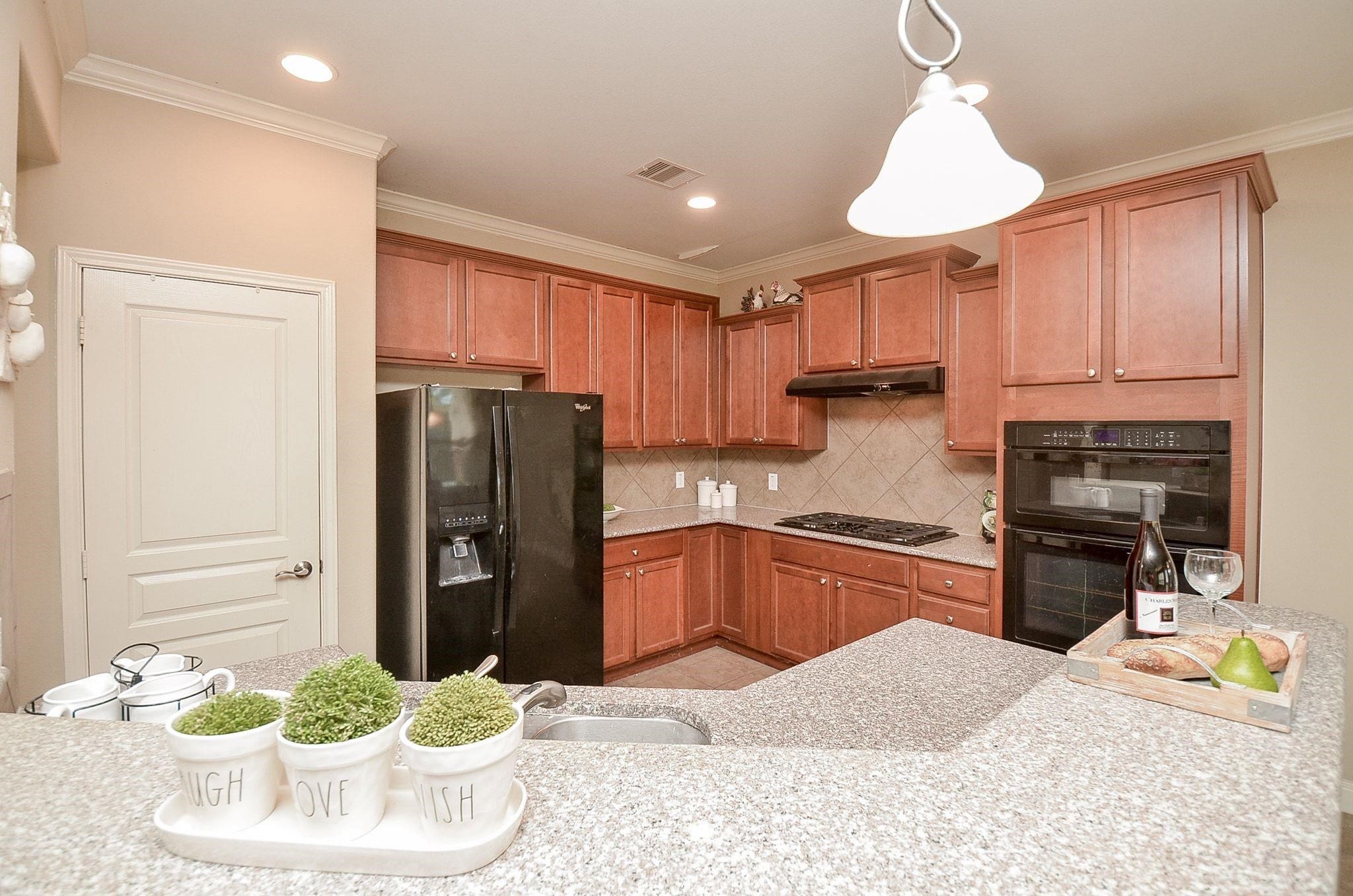 Large Corner Kitchen with lots of cabinetry and storage