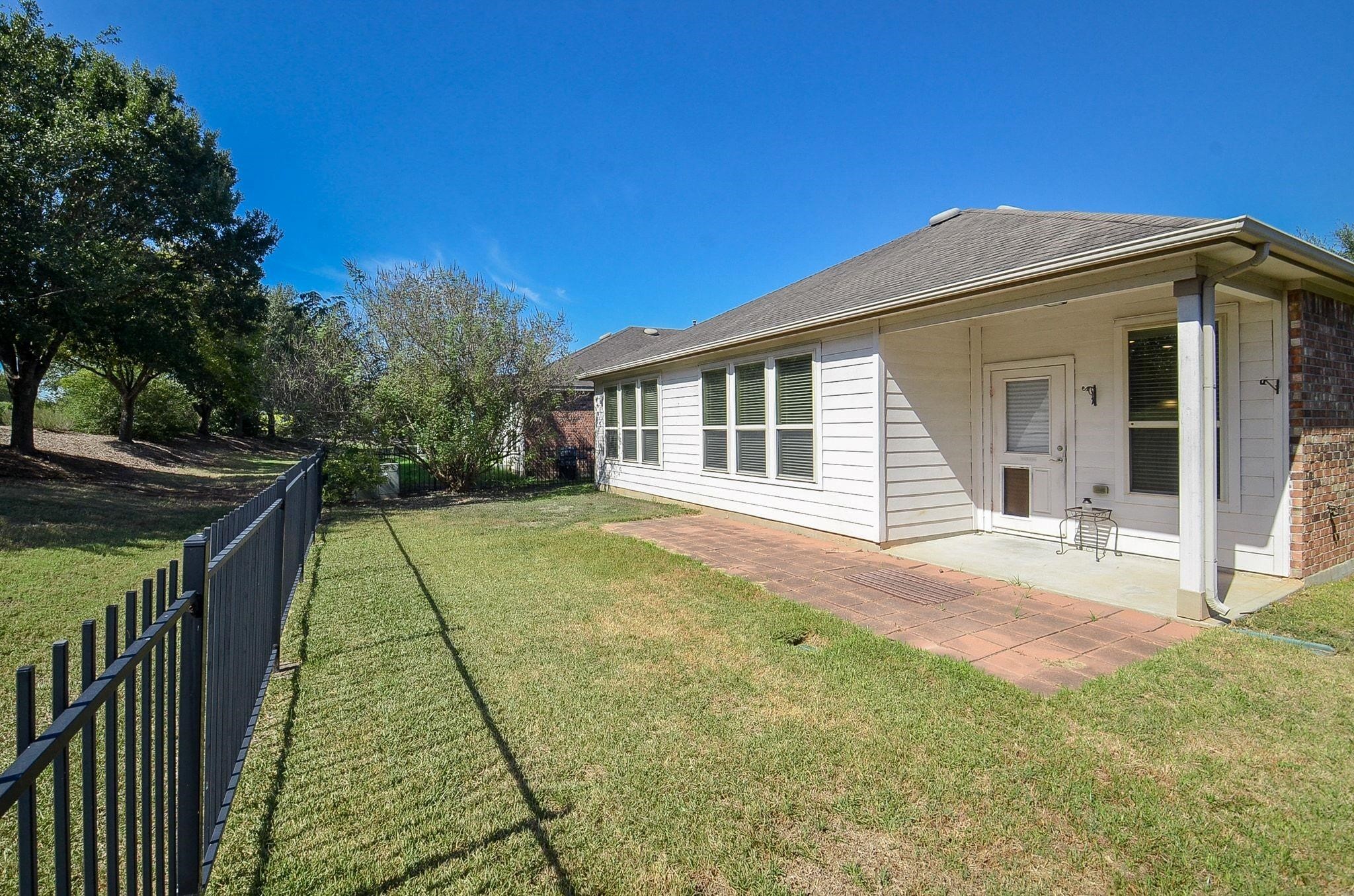 Low Maintenance, charming backyard with lots of potential