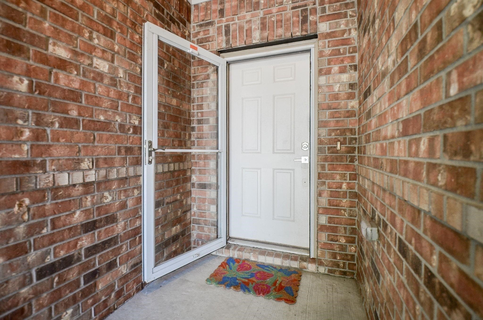 Stately Front Entry with Storm Door Stately Front Entry with Storm Door