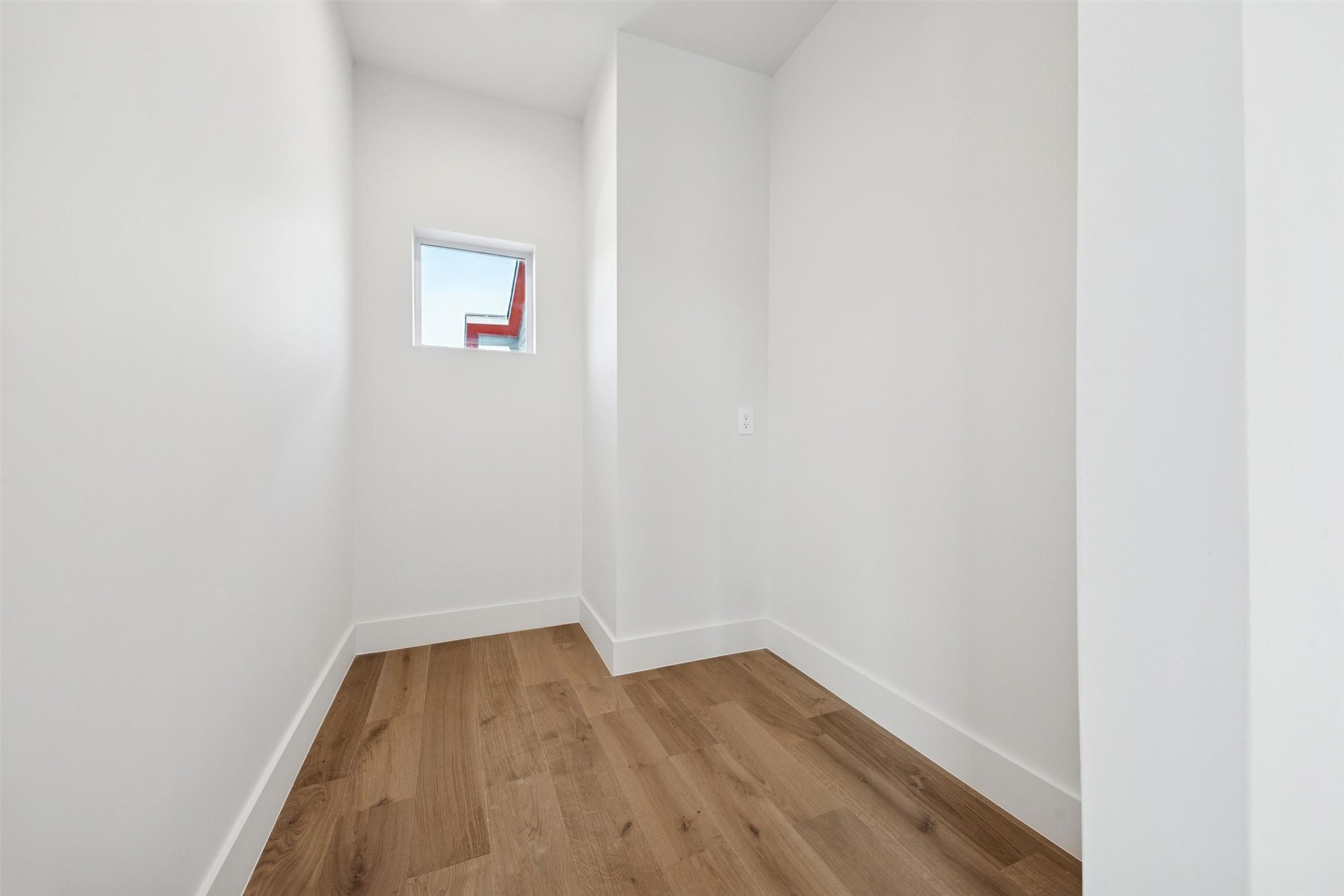 One of two spaces off the 3rd floor space that can serve as a walk-in closet, kitchenette are or storage closet.