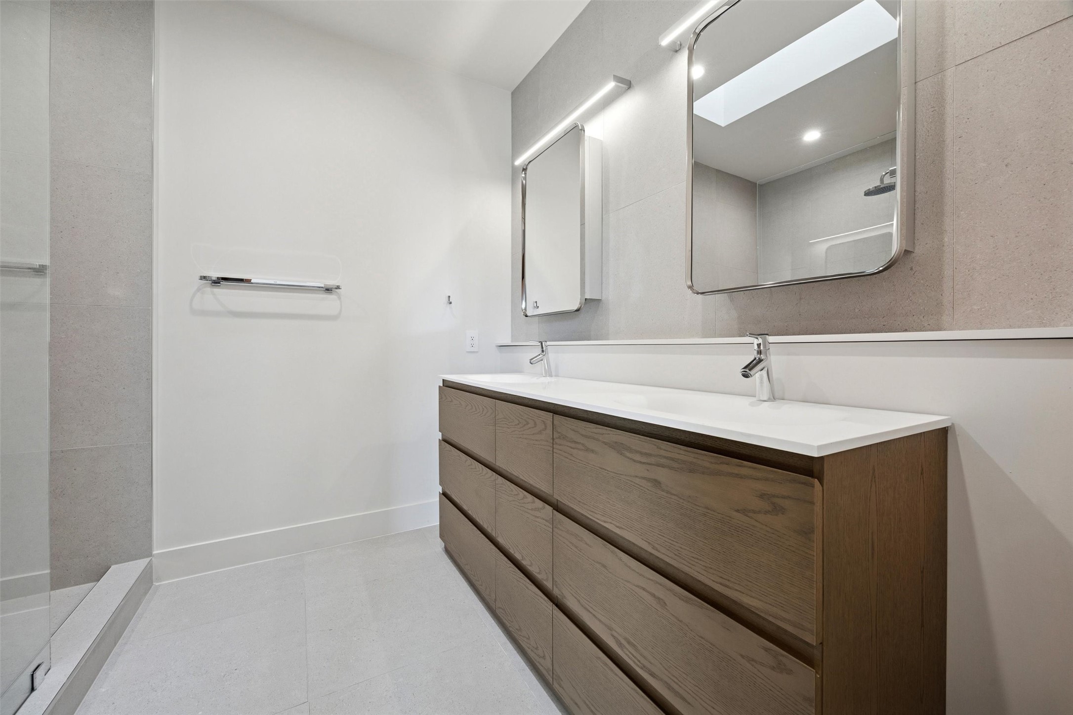 Third floor bathroom is stunning and perfect to serve as a second primary suite.
