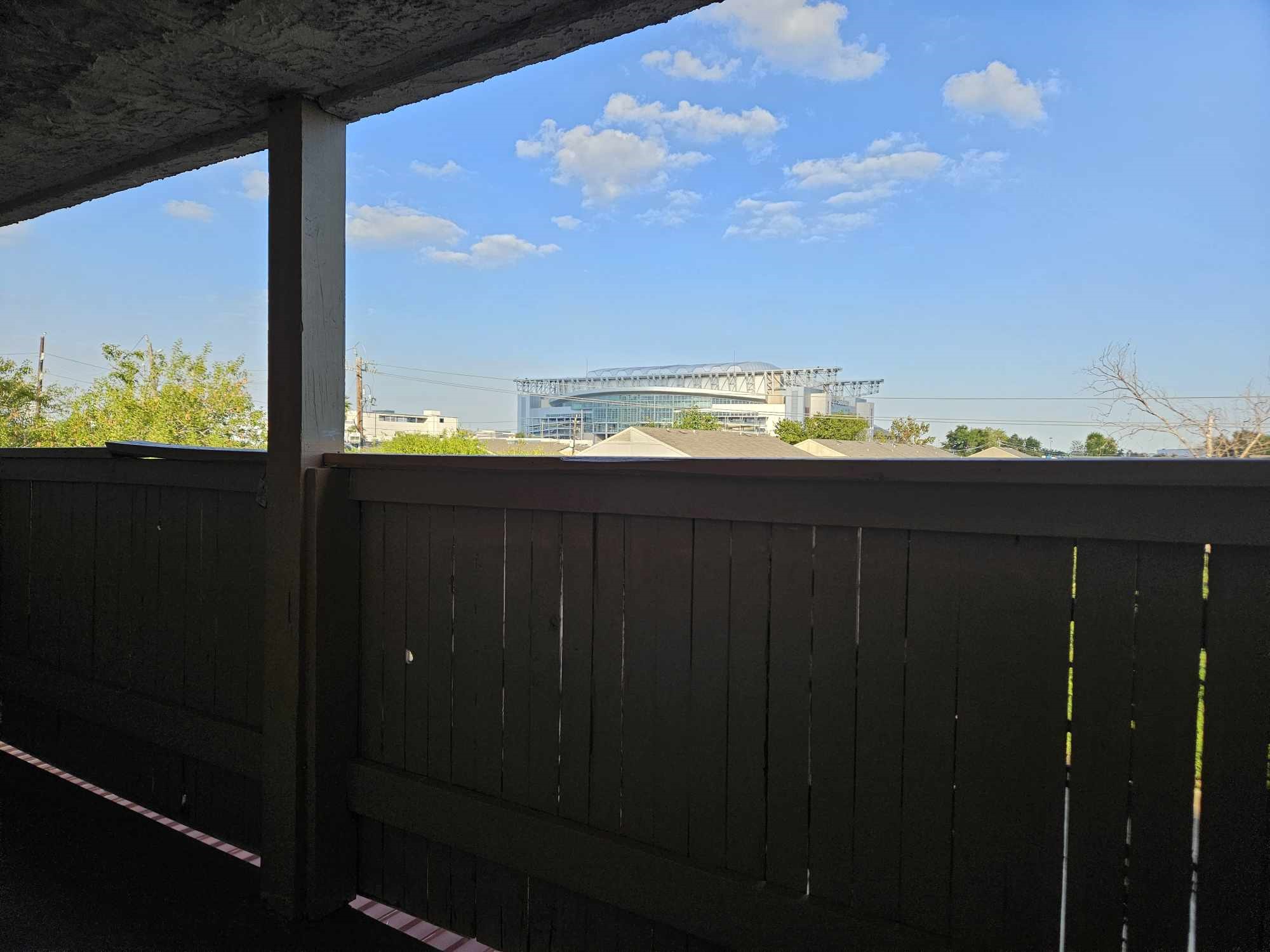 Relax in the Balcony with breath taking view of the sky and NRG Stadium building.