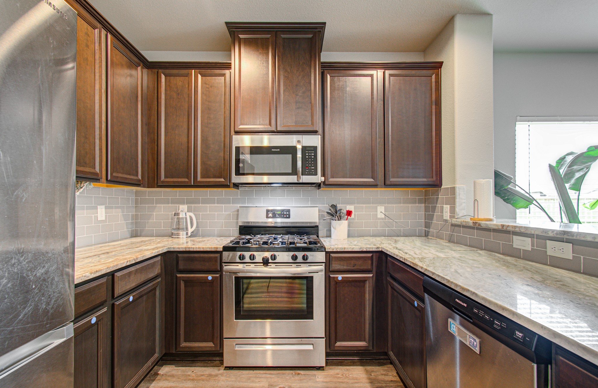 42 inch cabinets, granite countertops, and stainless steel appliances.