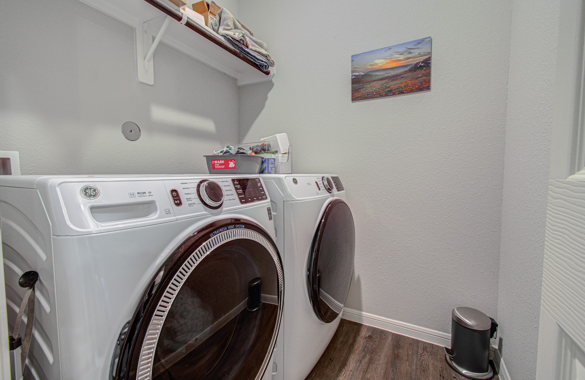in-house utility room. Smart Samsung W/D comes with home.