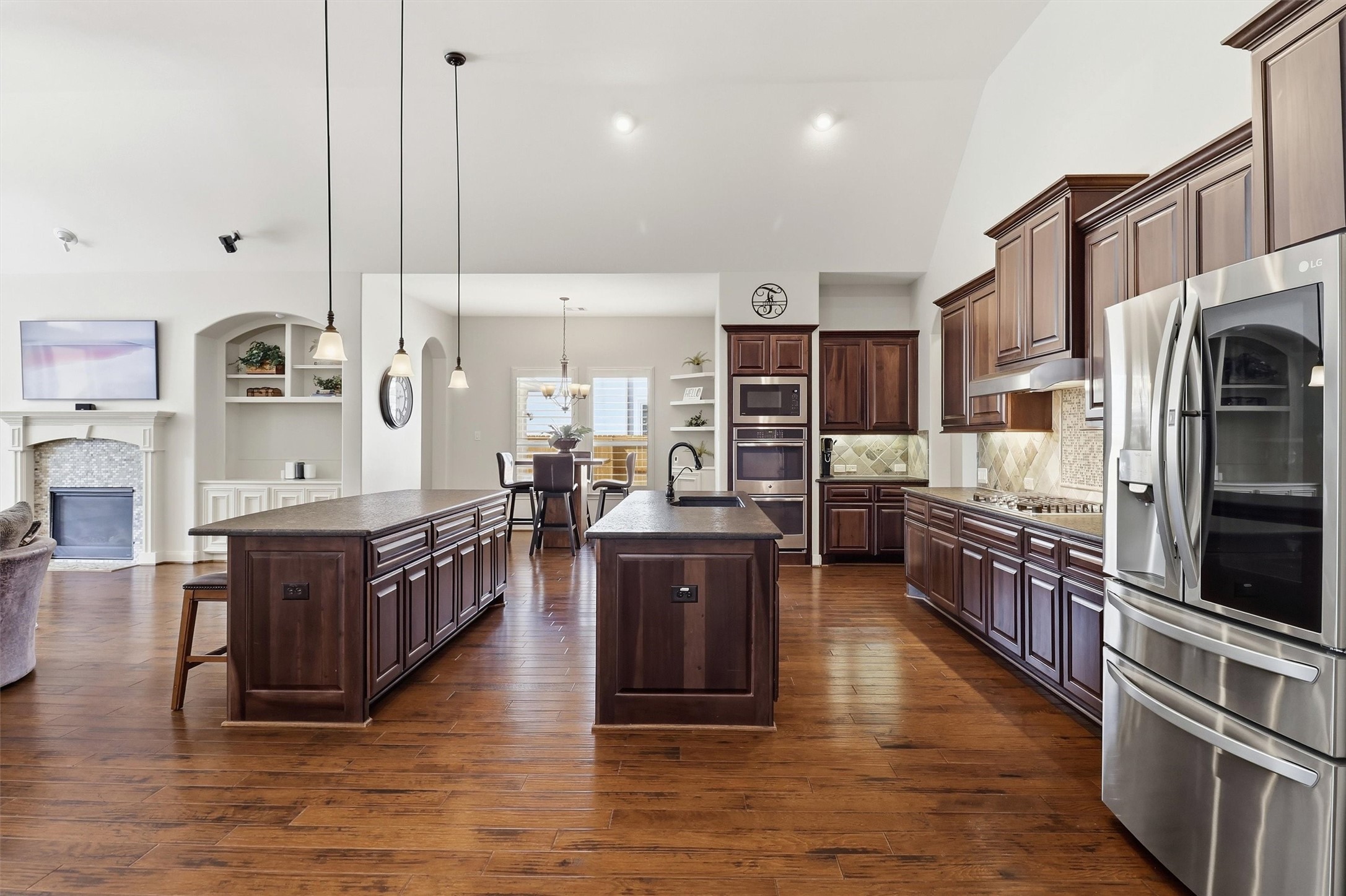 Double stainless ovens and amazing storage in this huge, open kitchen.