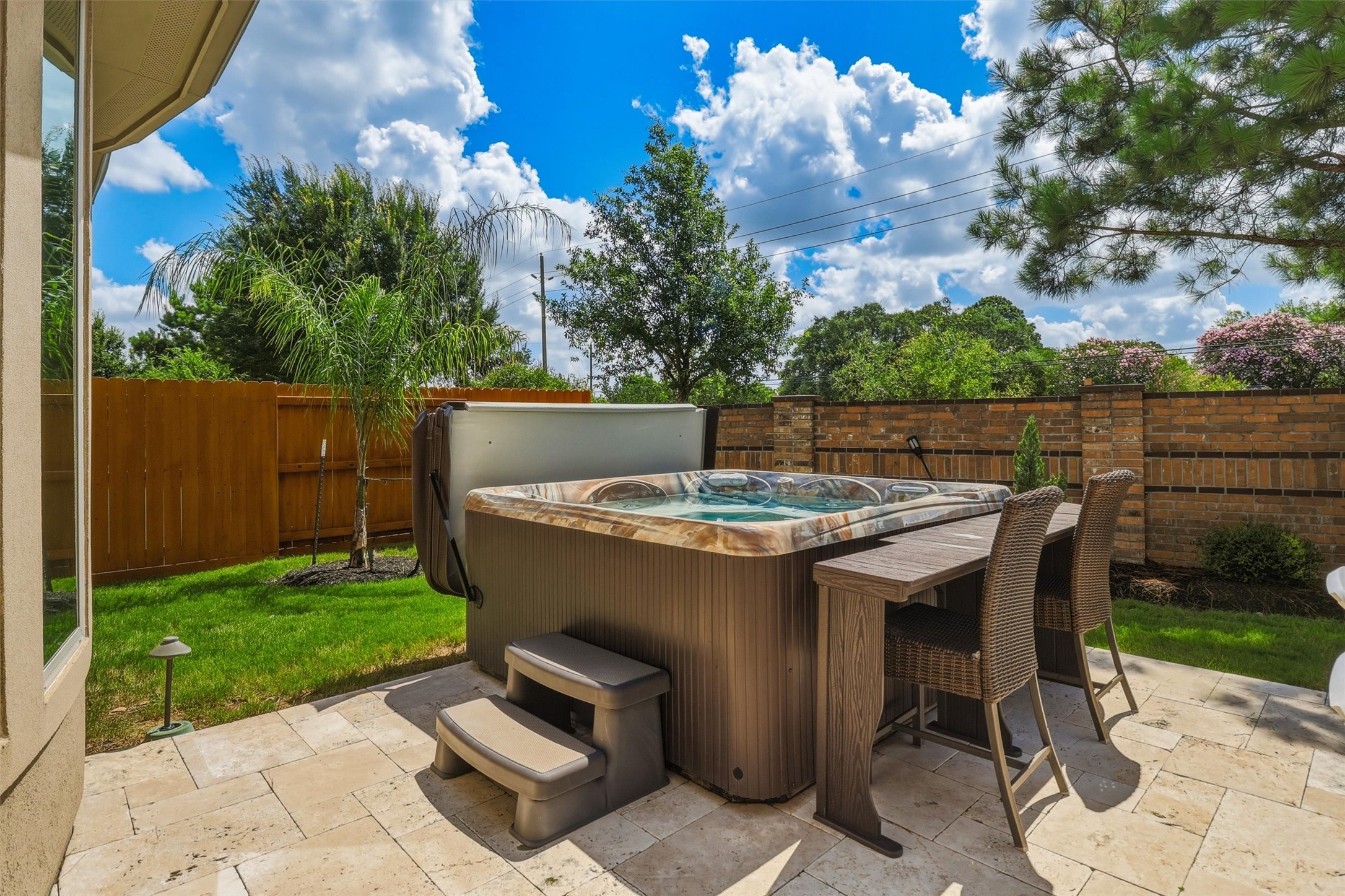 The large 3 yr old hot tub is the perfect spot to relax and unwind after a long day, with a seating area for extra guests to interact.  The hot tub is negotiable, but could be included with the right offer.