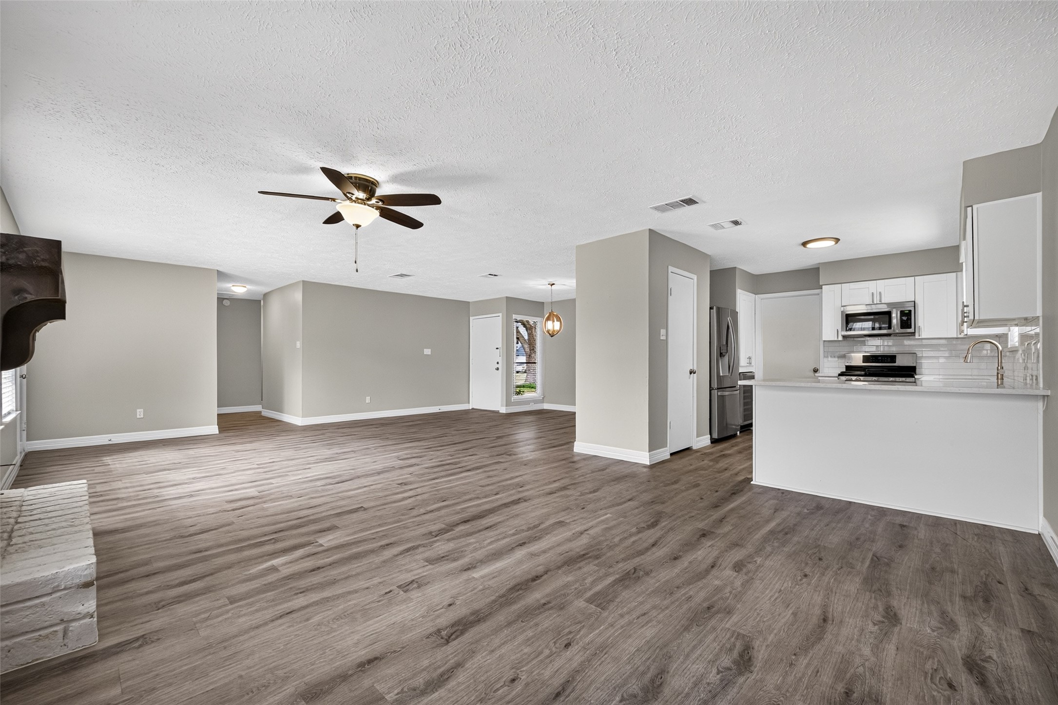 Kitchen with breakfast bar and open to family room