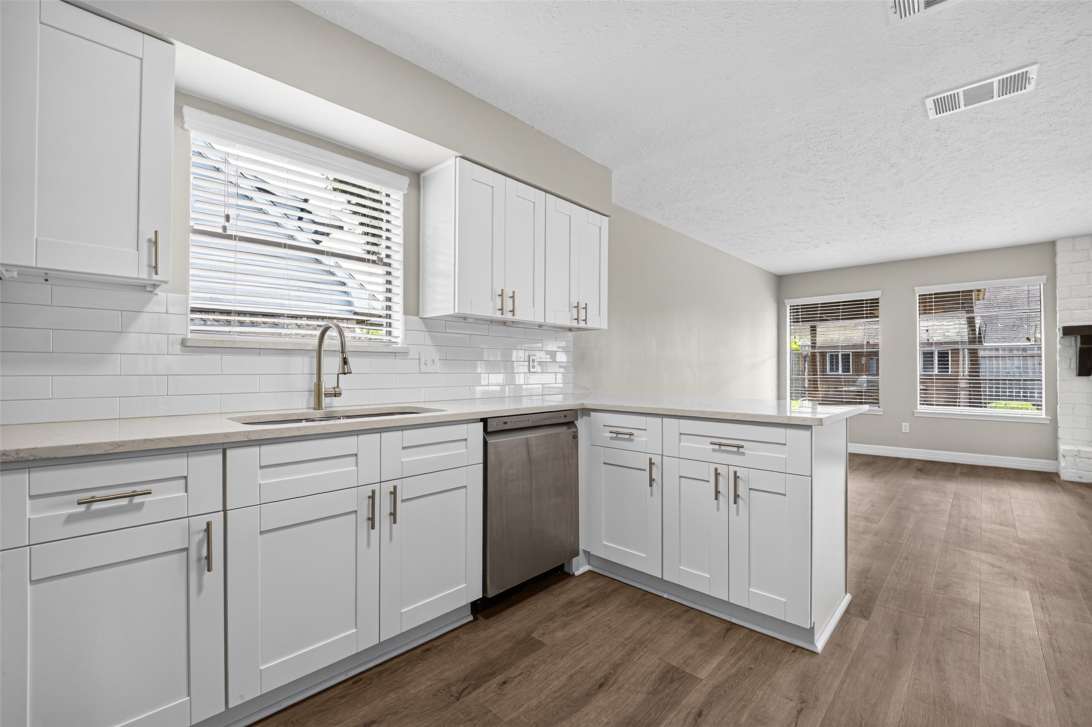 Updated appliances, cabinets, blinds, fixtures