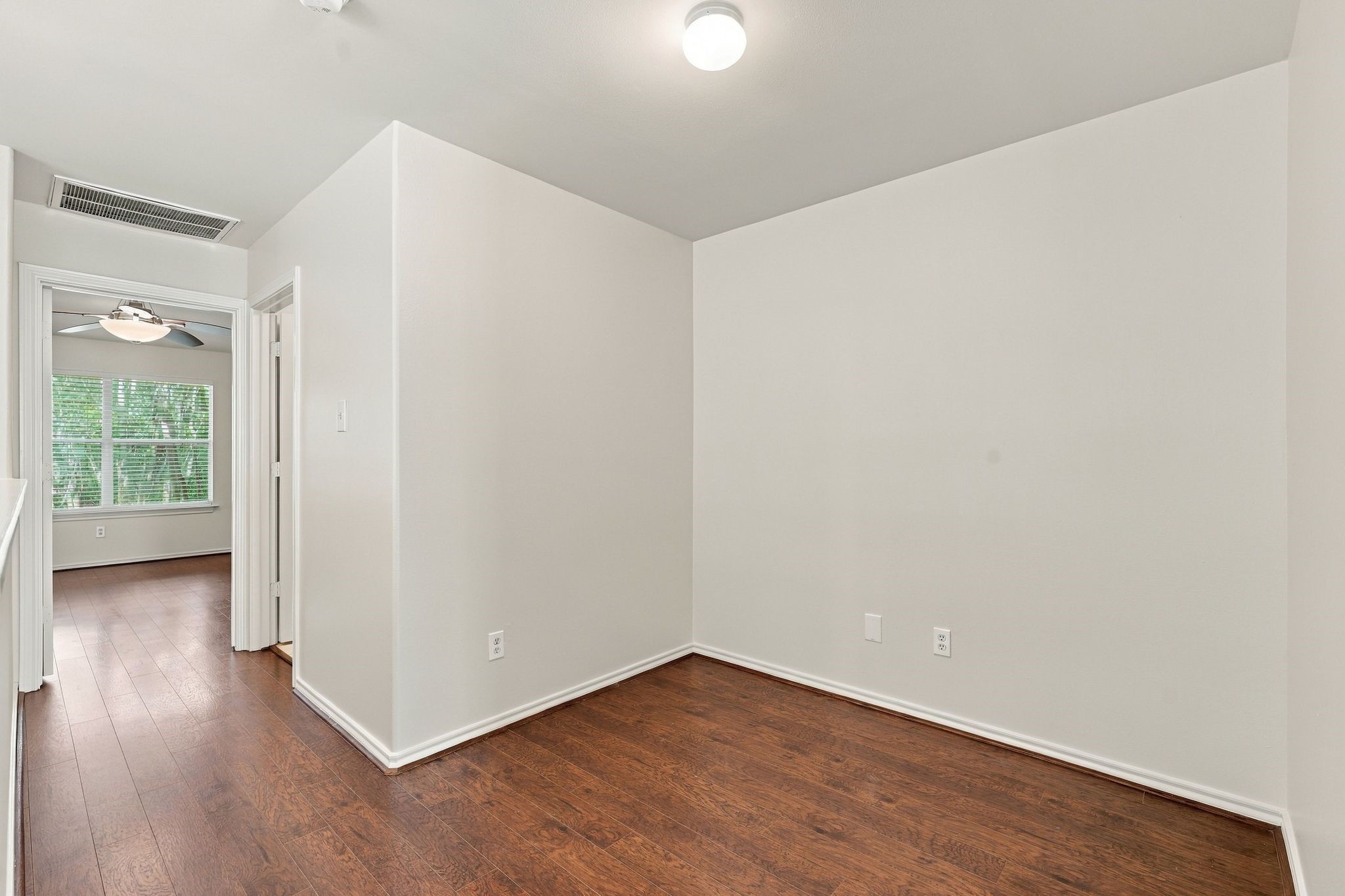 This versatile space separates the primary bedroom from the secondary bedrooms and could serve as a nice home office, play area for kids, tv or gaming space, craft room, etc.