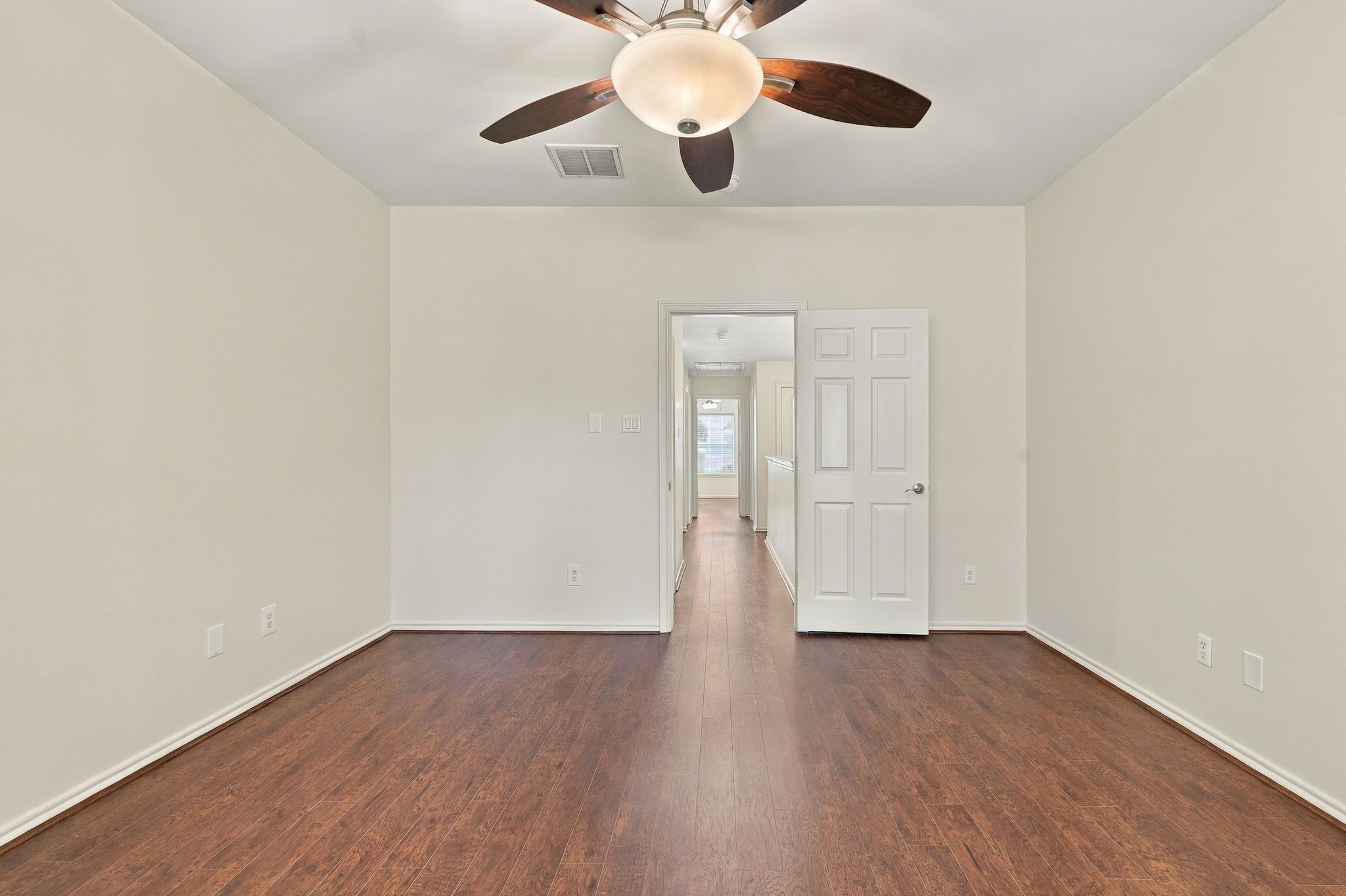 The main bedroom offers wood look flooring, new ceiling fan, freshly painted ceilings, walls and trim and a nice ensuite bathroom.