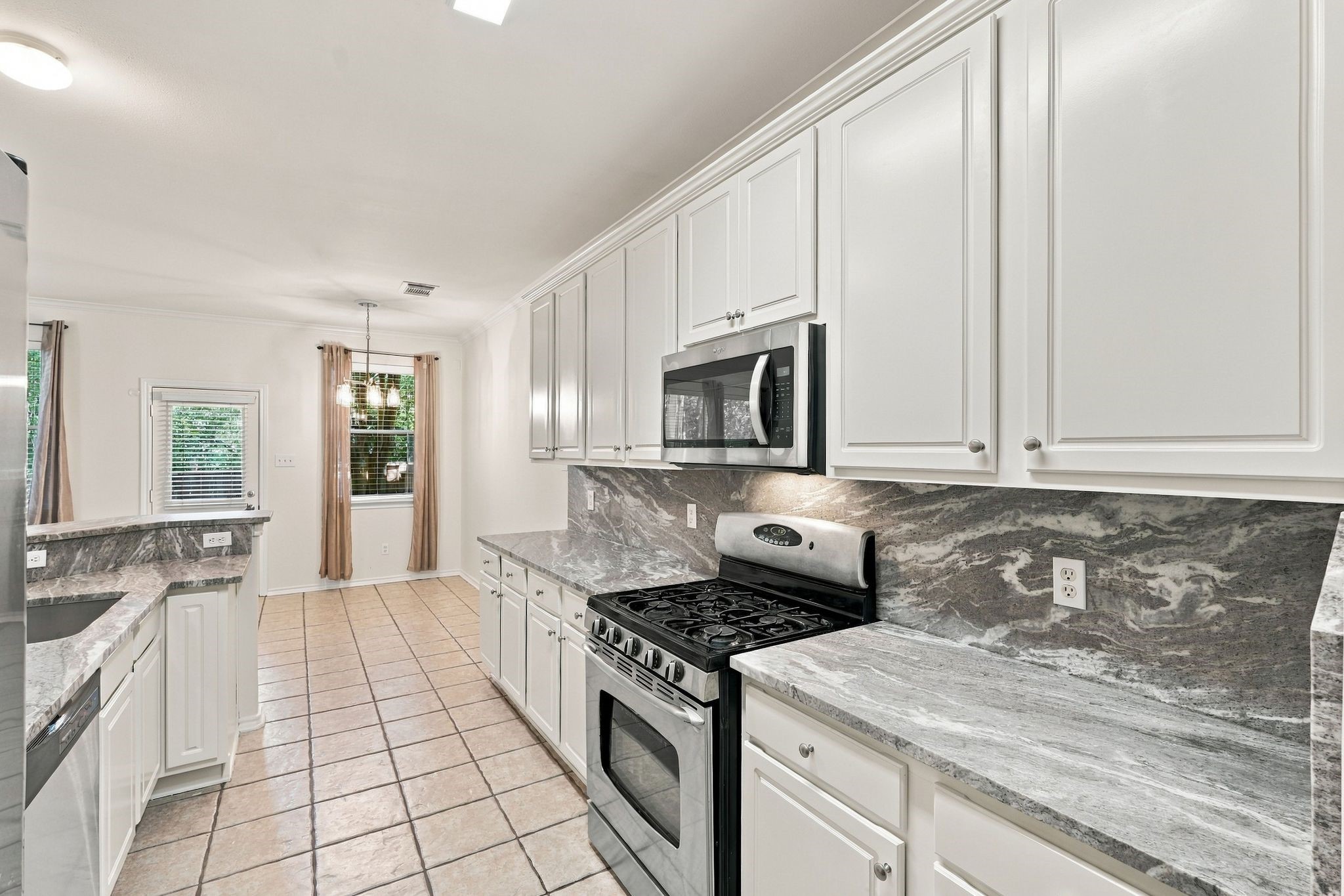 Be the first to enjoy these newly installed luxury granite counters, microwave, dishwasher and sink.   The cabinets have just been painted, and there are two large pantries that offer a significant amount of storage.